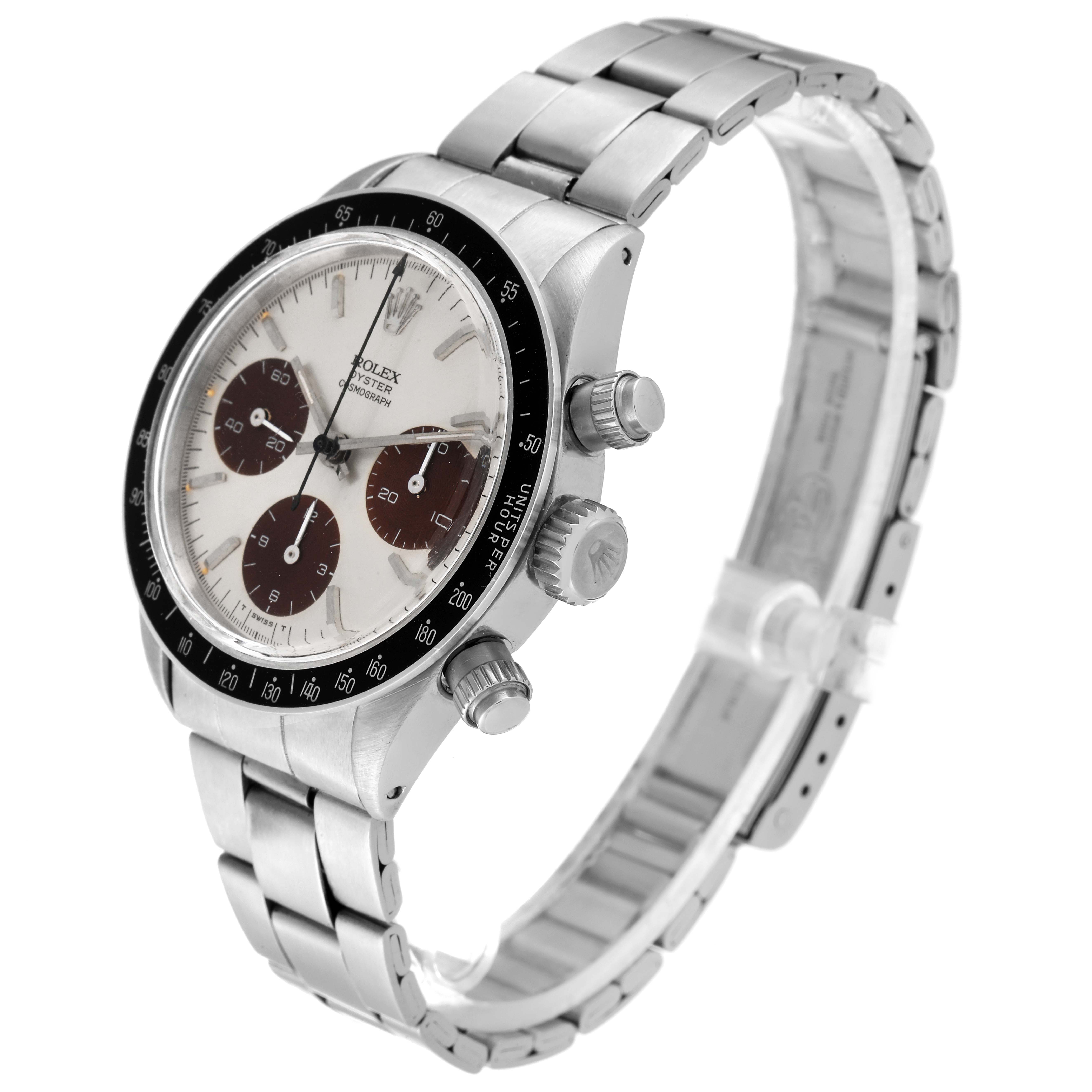 The Vintage Collection Rolex watch is shown at a three-quarter angle, highlighting its face, bezel, crown, and bracelet.