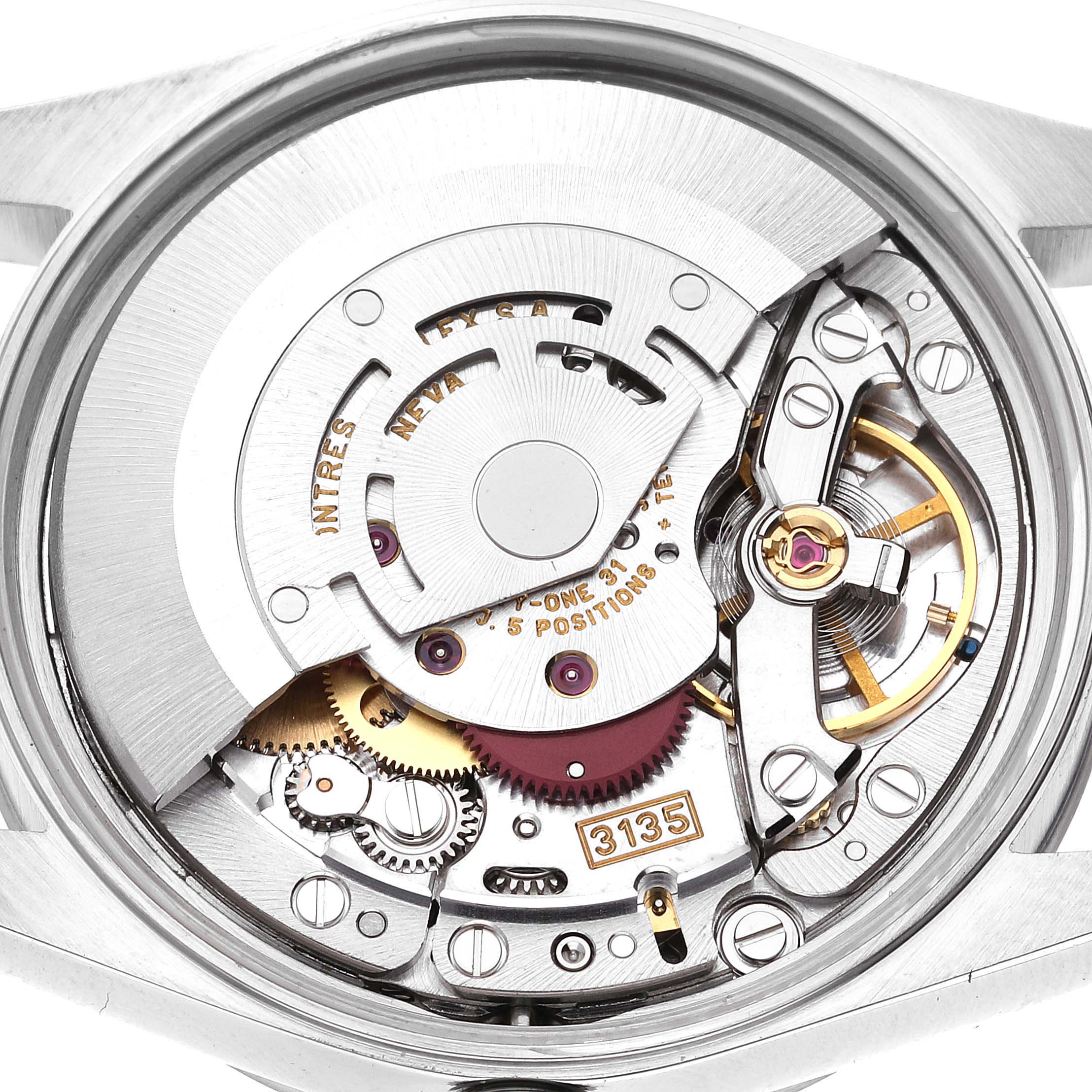 The image shows the internal movement mechanism of a Rolex Date 15200 Men's Stainless Steel Black Dial 15200 Men's Stainless Steel Black Dial model watch, viewed from the back.