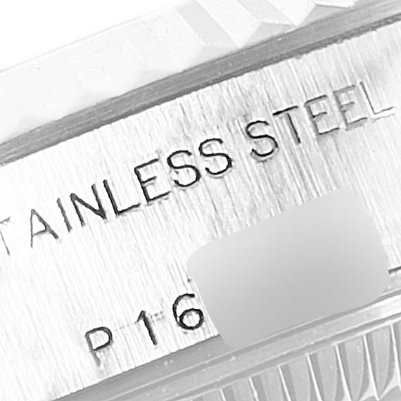 This image shows a close-up of the stainless steel case of a Rolex Datejust 79174 Women's Stainless Steel Blue Dial 79174 Women's Stainless Steel Blue Dial watch.