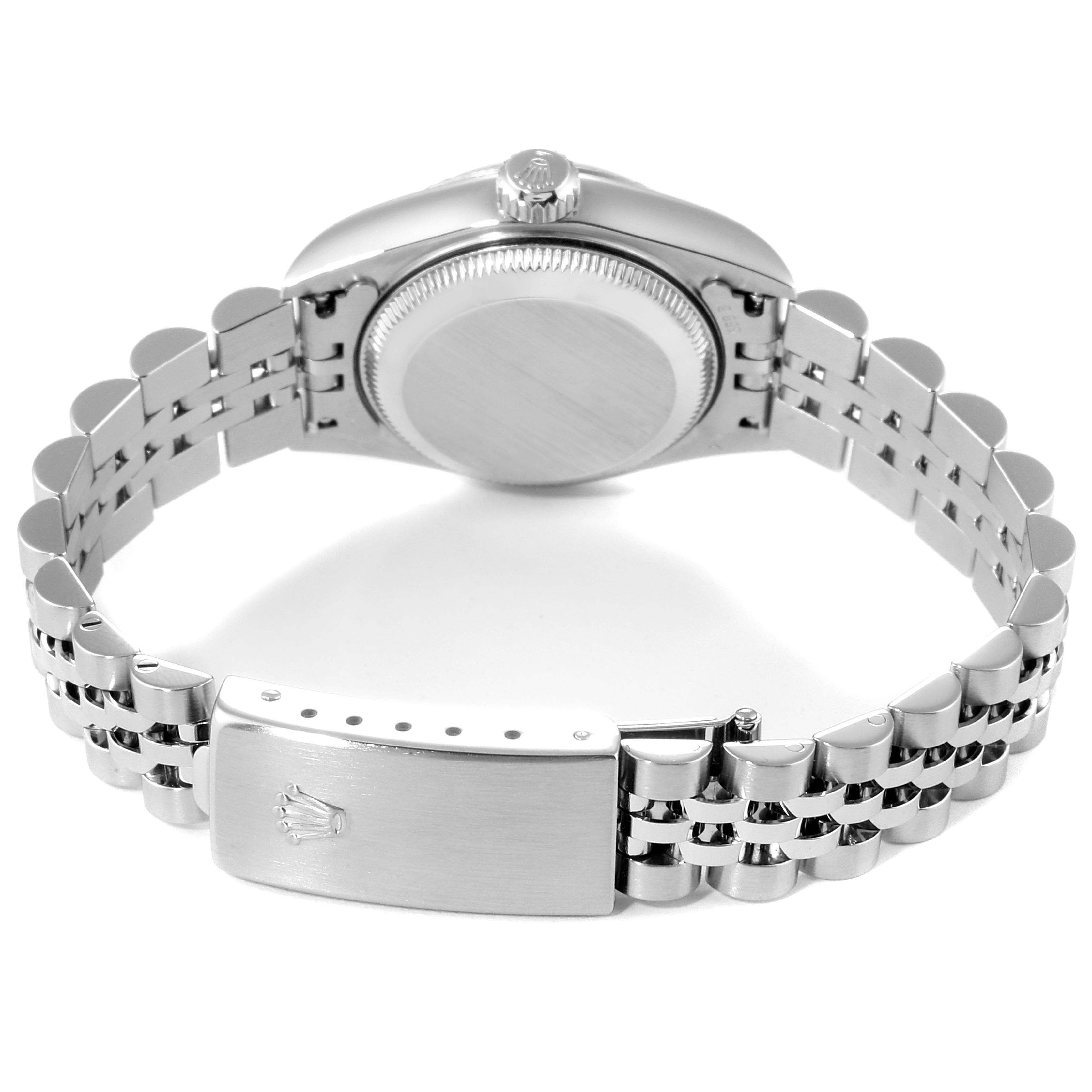 This image shows a rear view of a Rolex Datejust 79174 Women's Stainless Steel Pink Dial 79174 Women's Stainless Steel Pink Dial watch displaying its closed case back and metal bracelet.