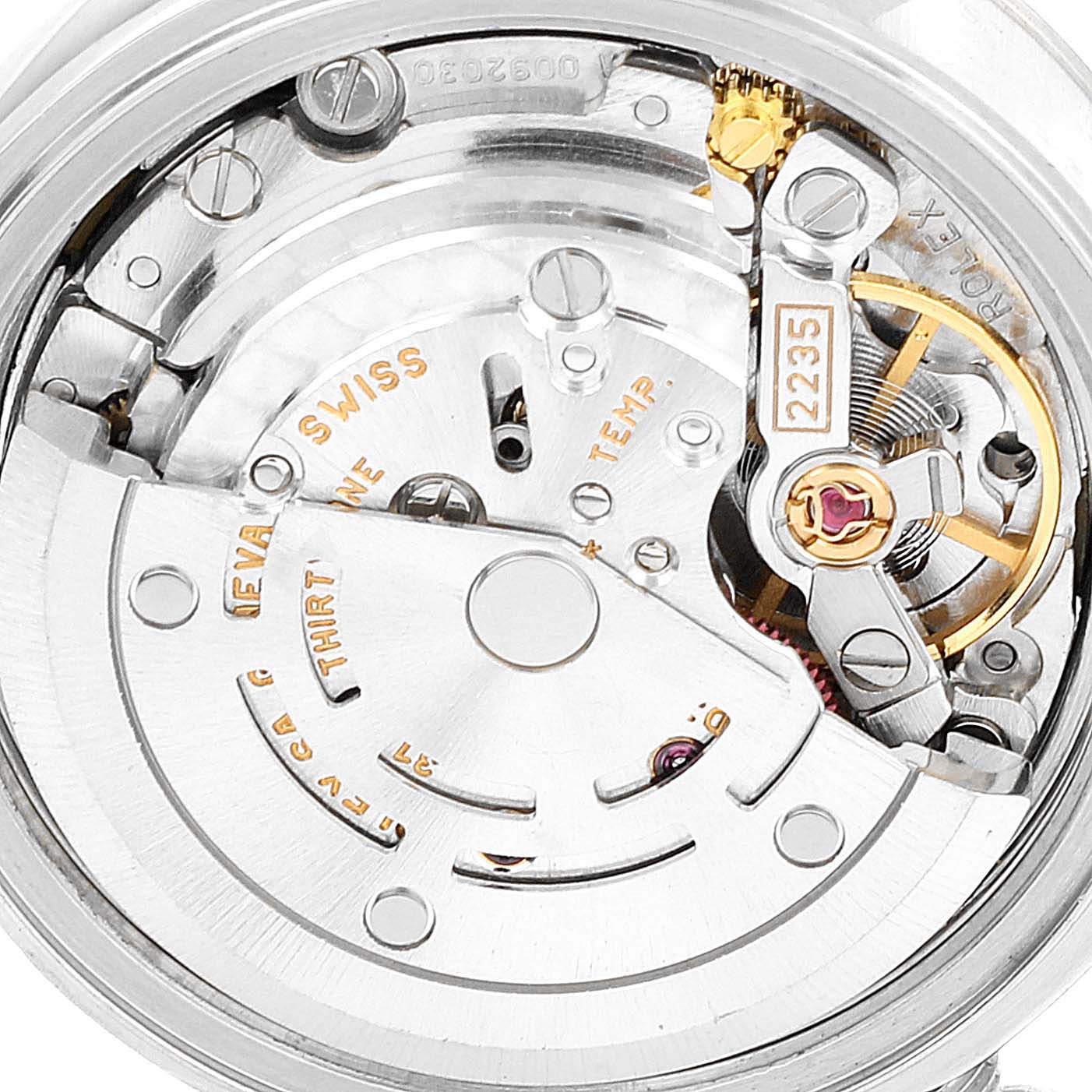 The image shows a close-up of the movement mechanism inside a Rolex Datejust 79174 Women's Stainless Steel White Dial 79174 Women's Stainless Steel White Dial watch, displaying detailed components.