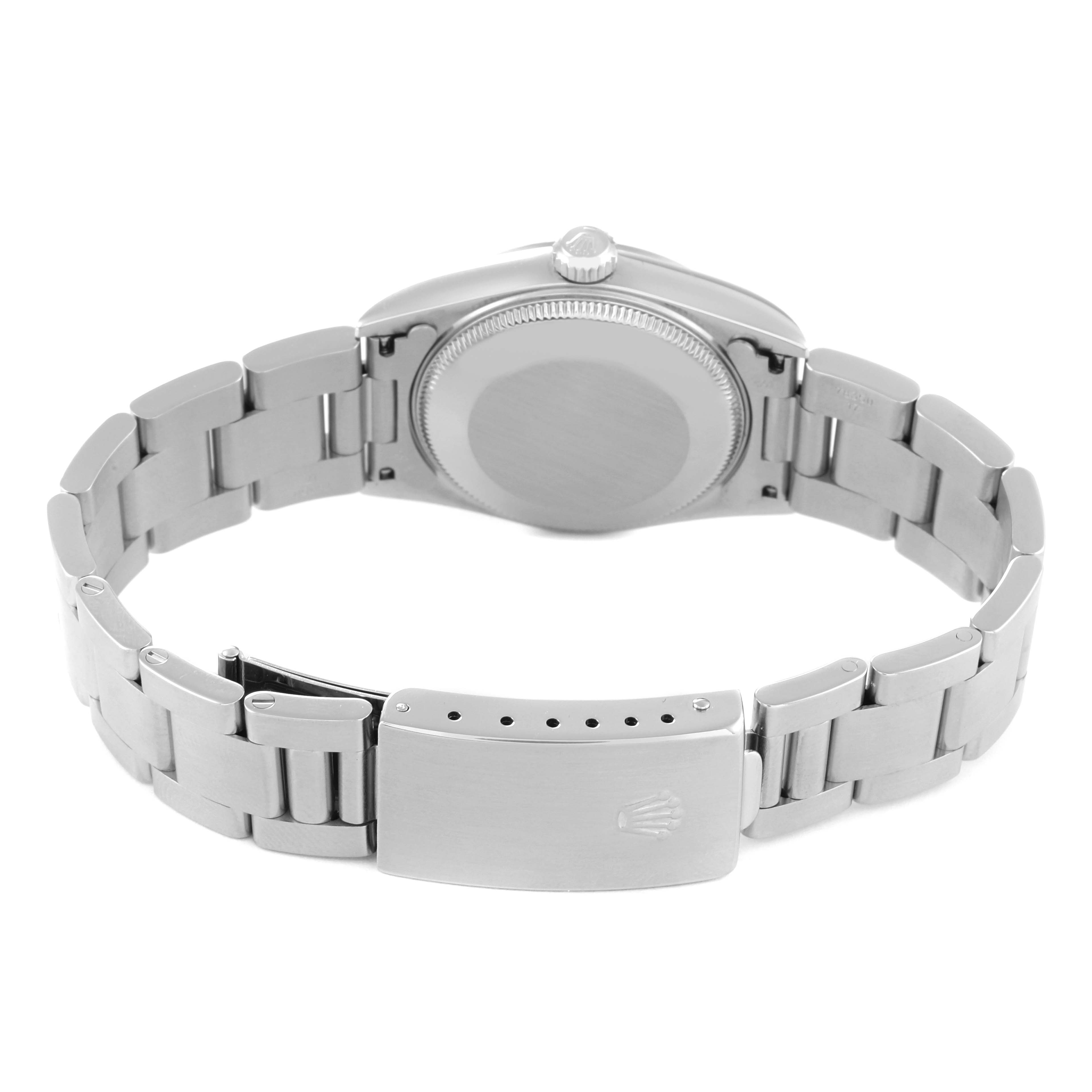 This image shows the back view of a Mid-Size Rolex watch, highlighting its clasp and bracelet.