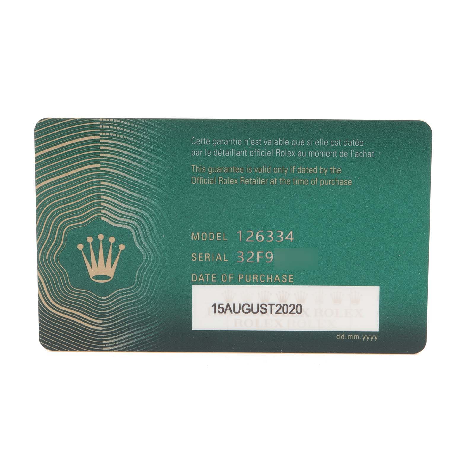 This image shows the warranty card for the Rolex Datejust 41 126334 Men's Stainless Steel Blue Dial 126334 Men's Stainless Steel Blue Dial model, providing model and serial numbers along with the purchase date.
