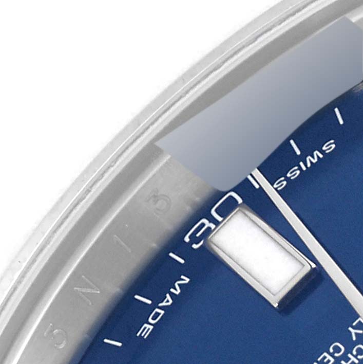 This image shows a close-up of the blue dial and silver hour marker on a Rolex Datejust 41 116334 Men
s Stainless Steel Blue Dial 116334 Men
s Stainless Steel Blue Dial watch.