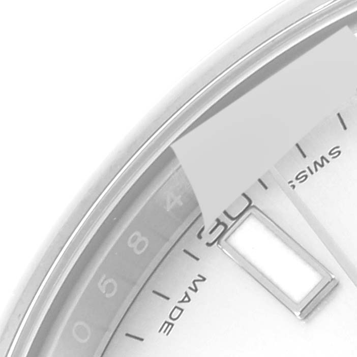 This image shows a close-up of the edge of the dial and part of the bezel of a Rolex Datejust 41 116300 Men
s Stainless Steel Silver Dial 116300 Men
s Stainless Steel Silver Dial watch.