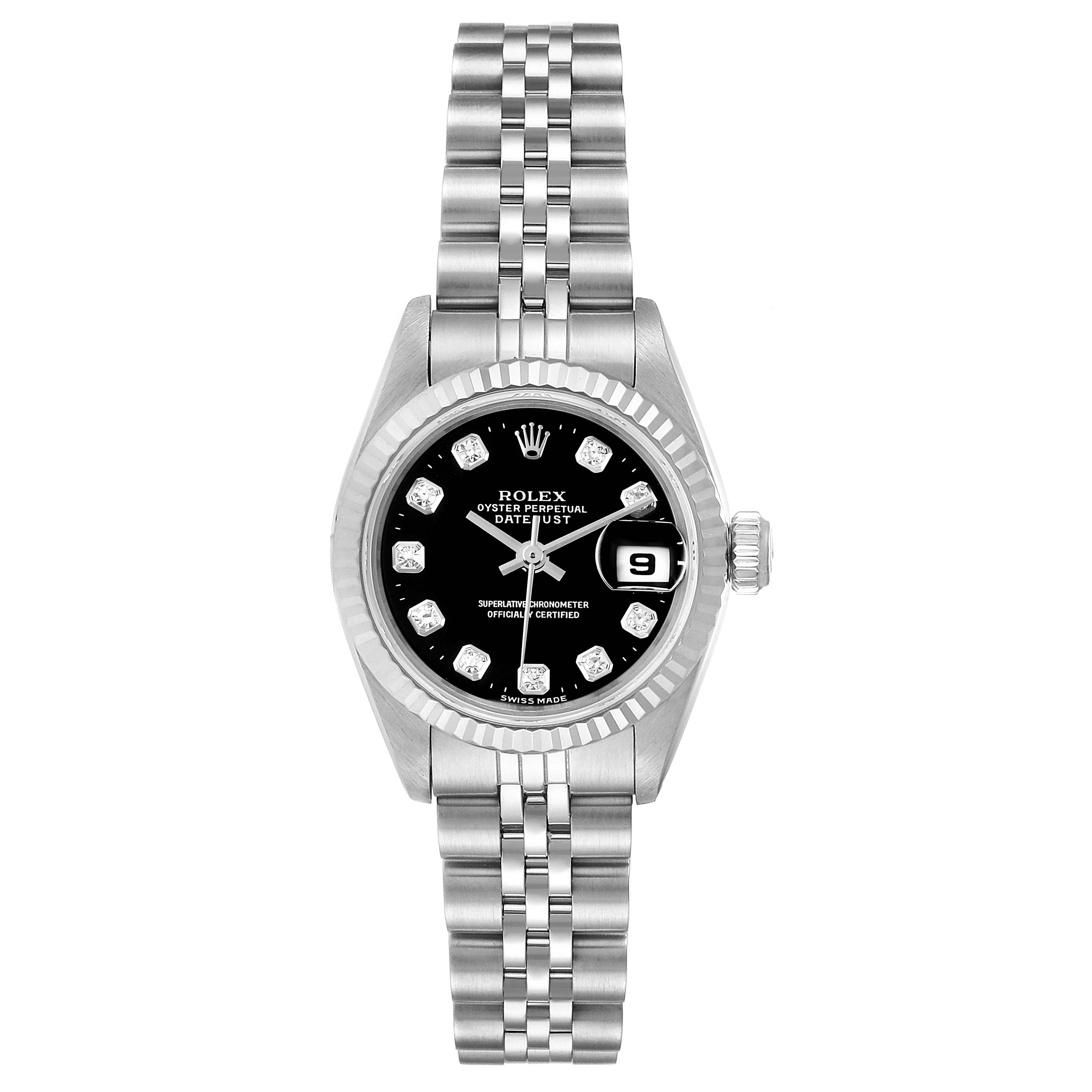 This image shows a Rolex Datejust 69174 Women
s Stainless Steel Black Dial 69174 Women
s Stainless Steel Black Dial watch from a top-down angle, highlighting its dial, case, bezel, and bracelet.