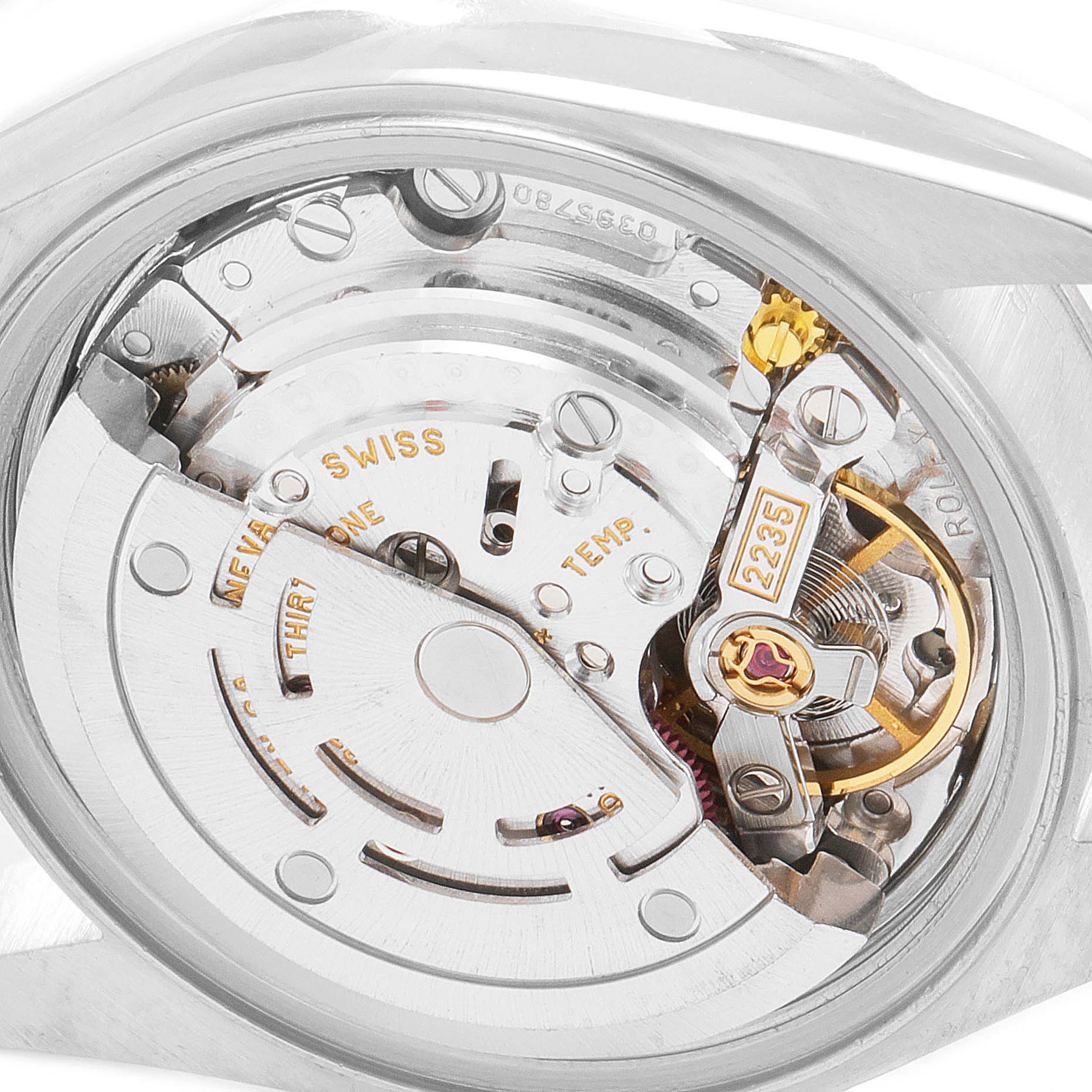 The image shows the movement mechanism of a Rolex Datejust 79174 Women's Steel and Gold (two tone) White Dial 79174 Women's Steel and Gold (two tone) White Dial watch from the back, highlighting intricate components and engravings.