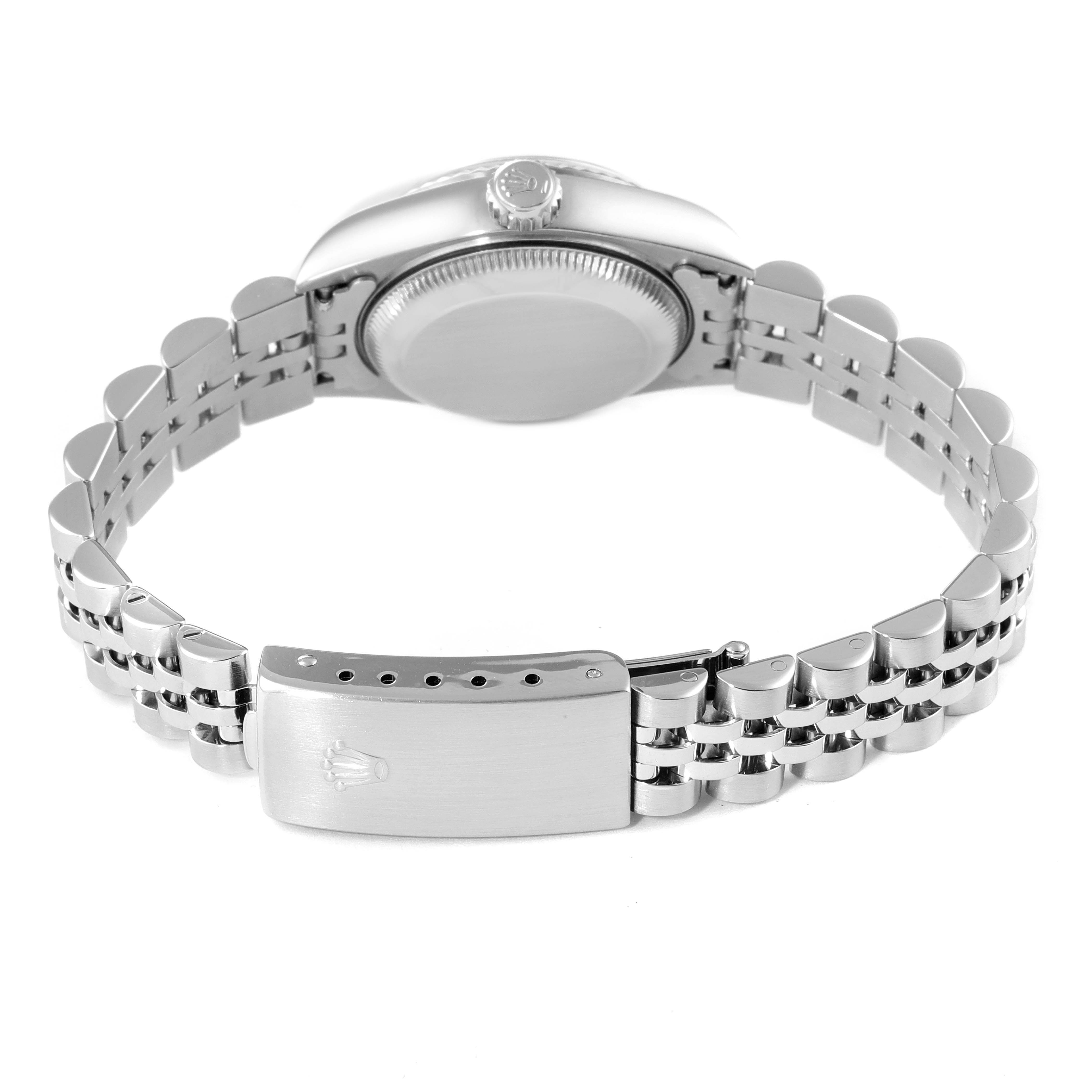 The image shows a rear view of a Rolex Datejust 79174 Women's Steel and Gold (two tone) White Dial 79174 Women's Steel and Gold (two tone) White Dial watch, highlighting the caseback and the bracelet clasp.