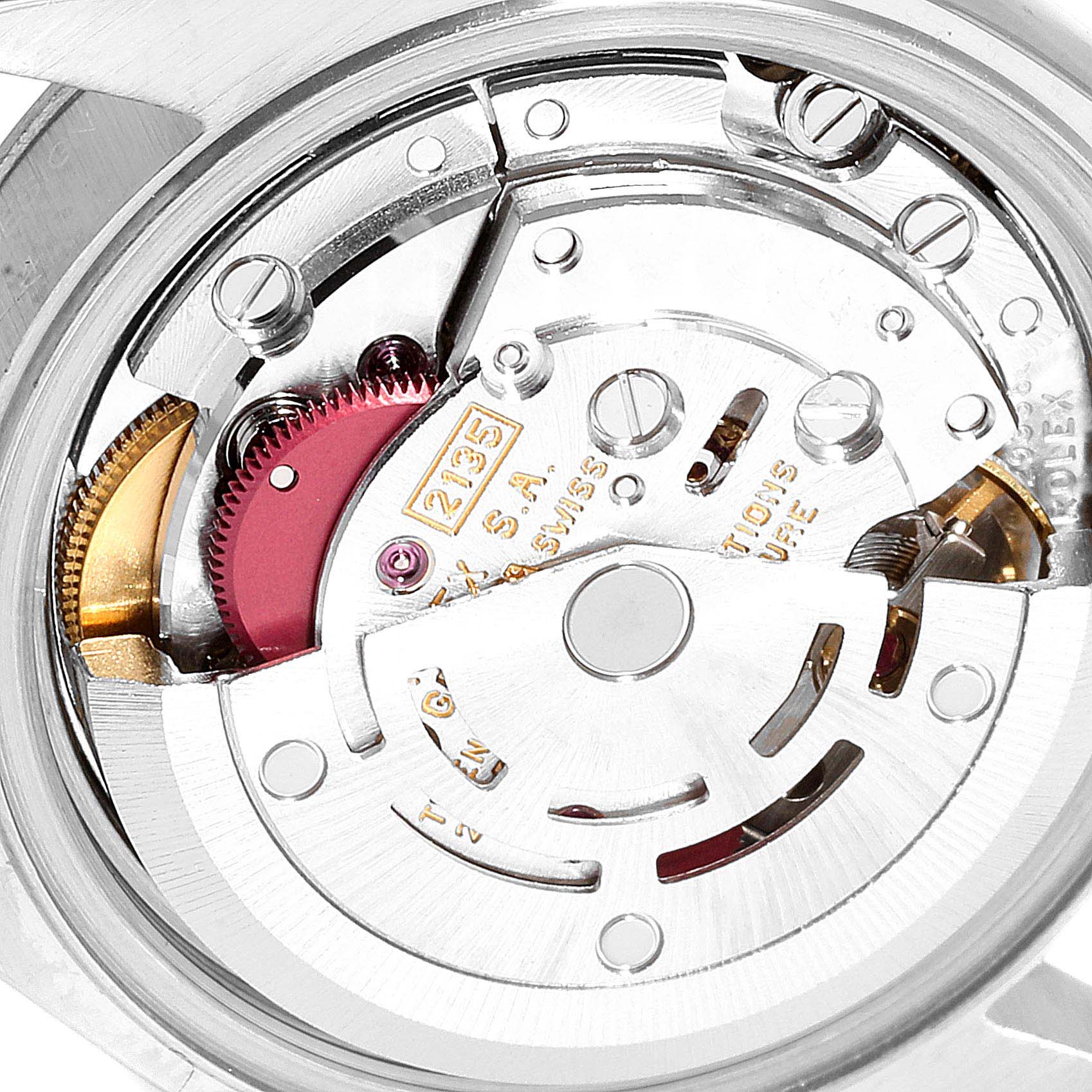 The image shows a close-up view of the movement mechanism inside a Rolex Datejust 69174 Women
s Stainless Steel Silver Dial 69174 Women
s Stainless Steel Silver Dial watch.
