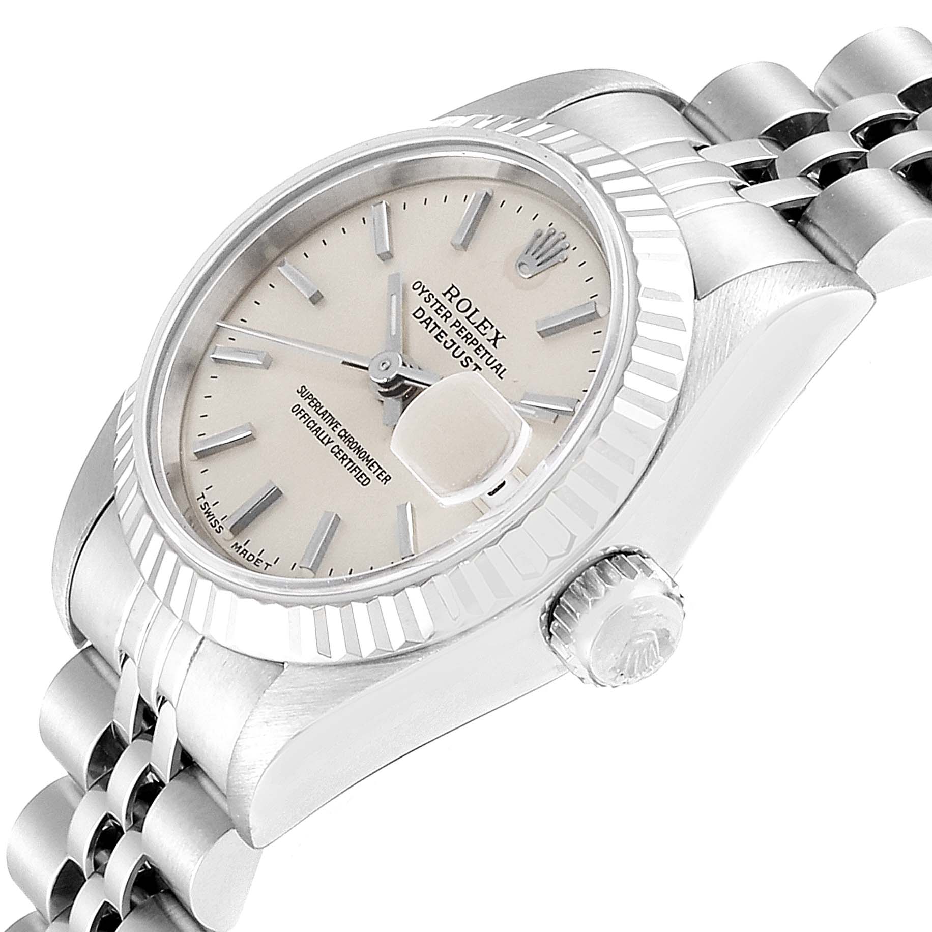 The image shows a side angle of a Rolex Datejust 69174 Women
s Stainless Steel Silver Dial 69174 Women
s Stainless Steel Silver Dial watch highlighting the crown, bezel, dial, and part of the Jubilee bracelet.