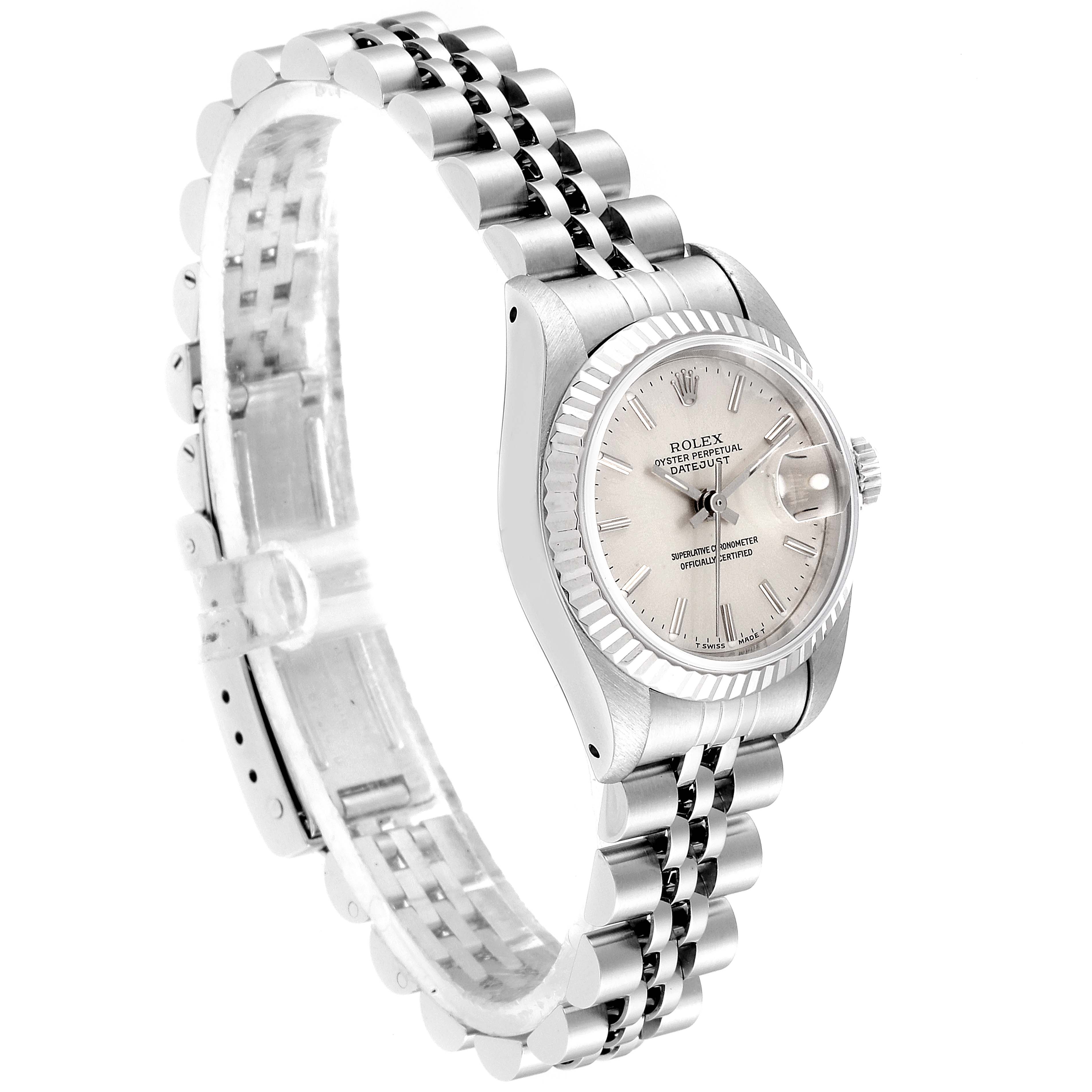 The image shows a Rolex Datejust 69174 Women
s Stainless Steel Silver Dial 69174 Women
s Stainless Steel Silver Dial watch angled to display the face, crown, and partially open bracelet.
