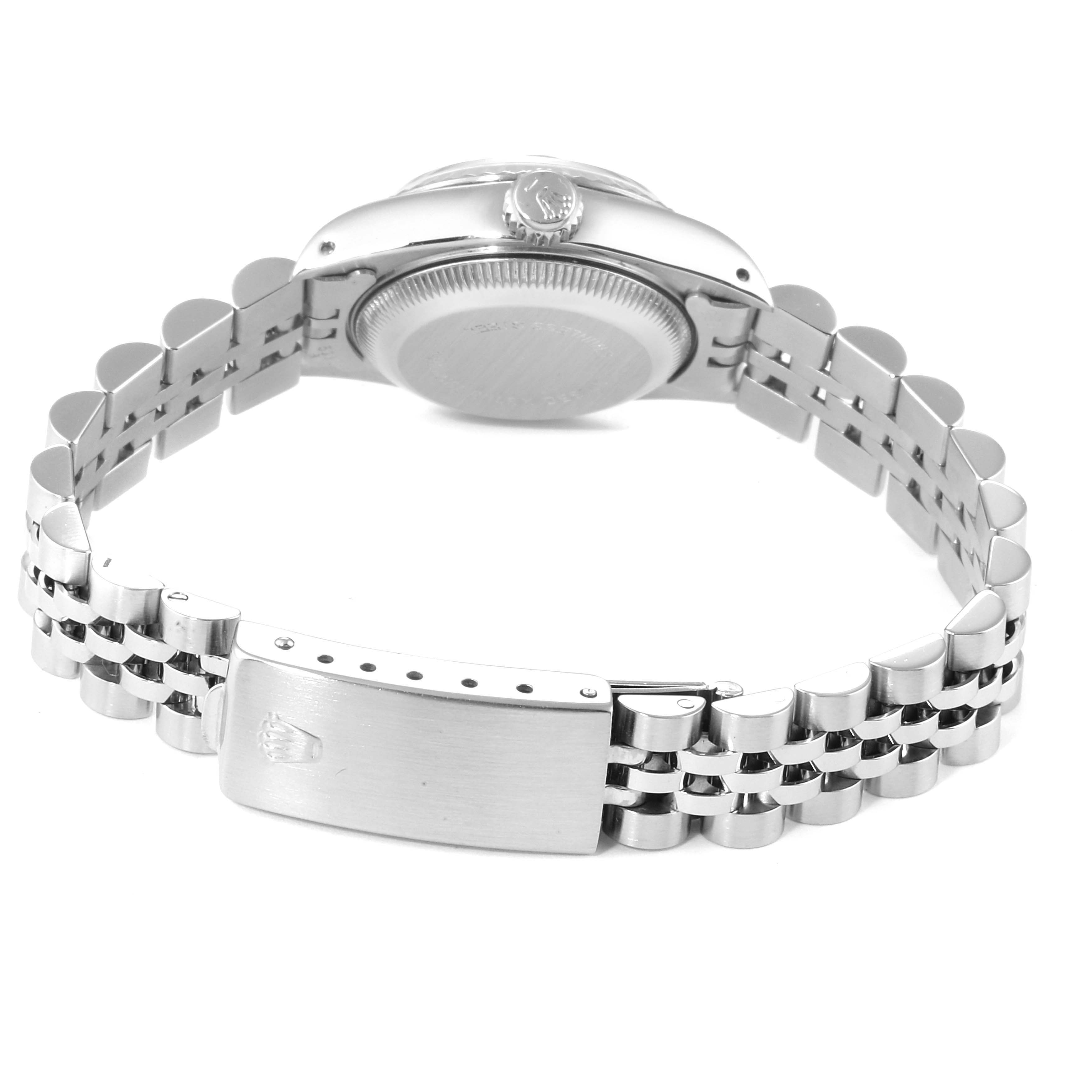 The image shows the back view of a Rolex Datejust 69174 Women
s Stainless Steel Silver Dial 69174 Women
s Stainless Steel Silver Dial model watch, focusing on the case back and bracelet clasp.