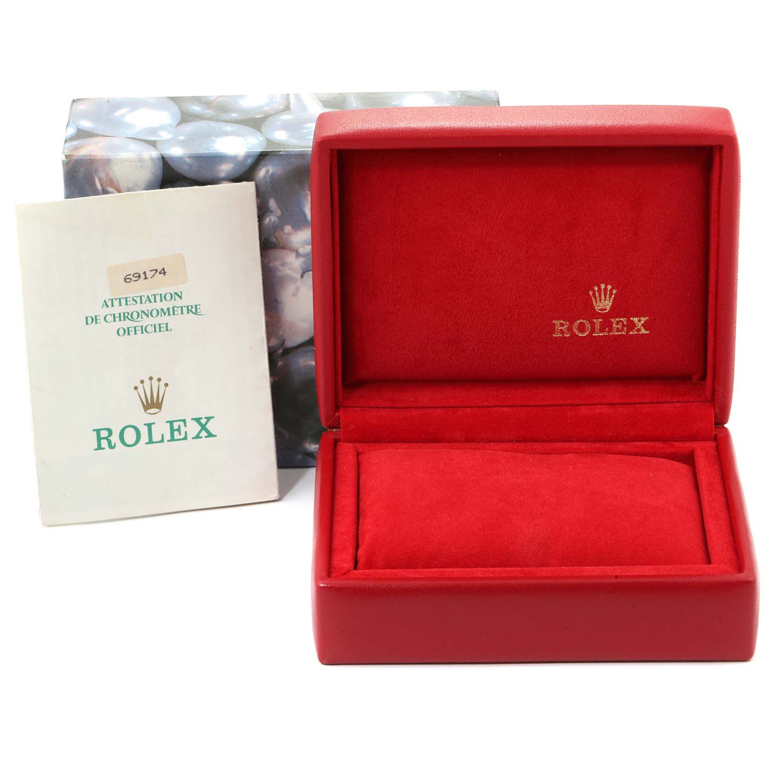 The image shows the empty red box, insert, booklet and outer box packaging for the Rolex Datejust 69174 Women
s Stainless Steel Silver Dial 69174 Women
s Stainless Steel Silver Dial model.