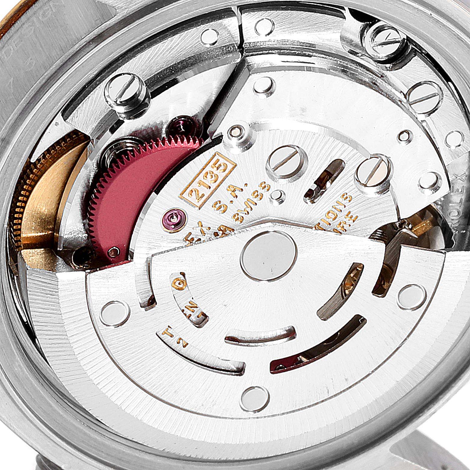 This image shows the internal mechanism of a Rolex Datejust 69173 Women
s Steel and Gold (two tone) Black Dial 69173 Women
s Steel and Gold (two tone) Black Dial watch, focusing on its intricate movement components.