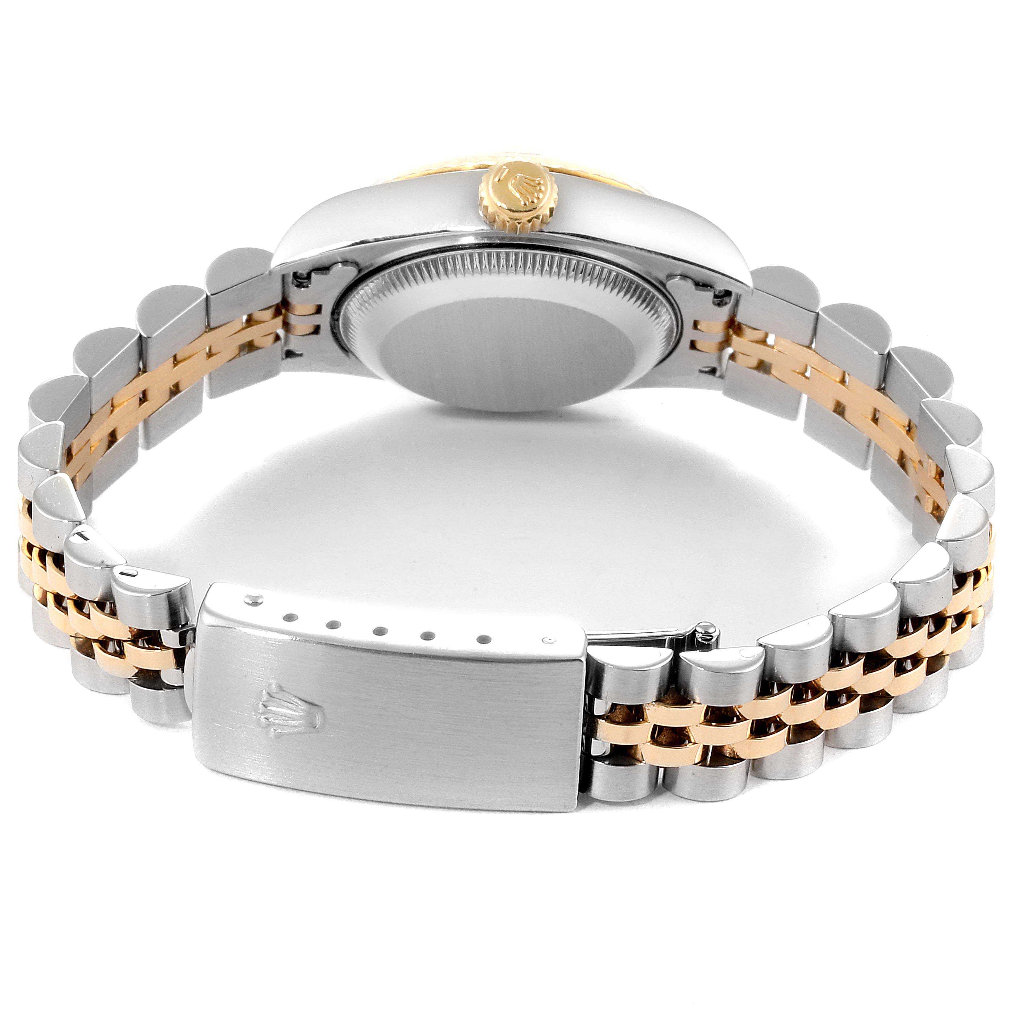 The image shows the back and bracelet of a Rolex Datejust 69173 Women
s Steel and Gold (two tone) Black Dial 69173 Women
s Steel and Gold (two tone) Black Dial watch, highlighting the clasp and crown.
