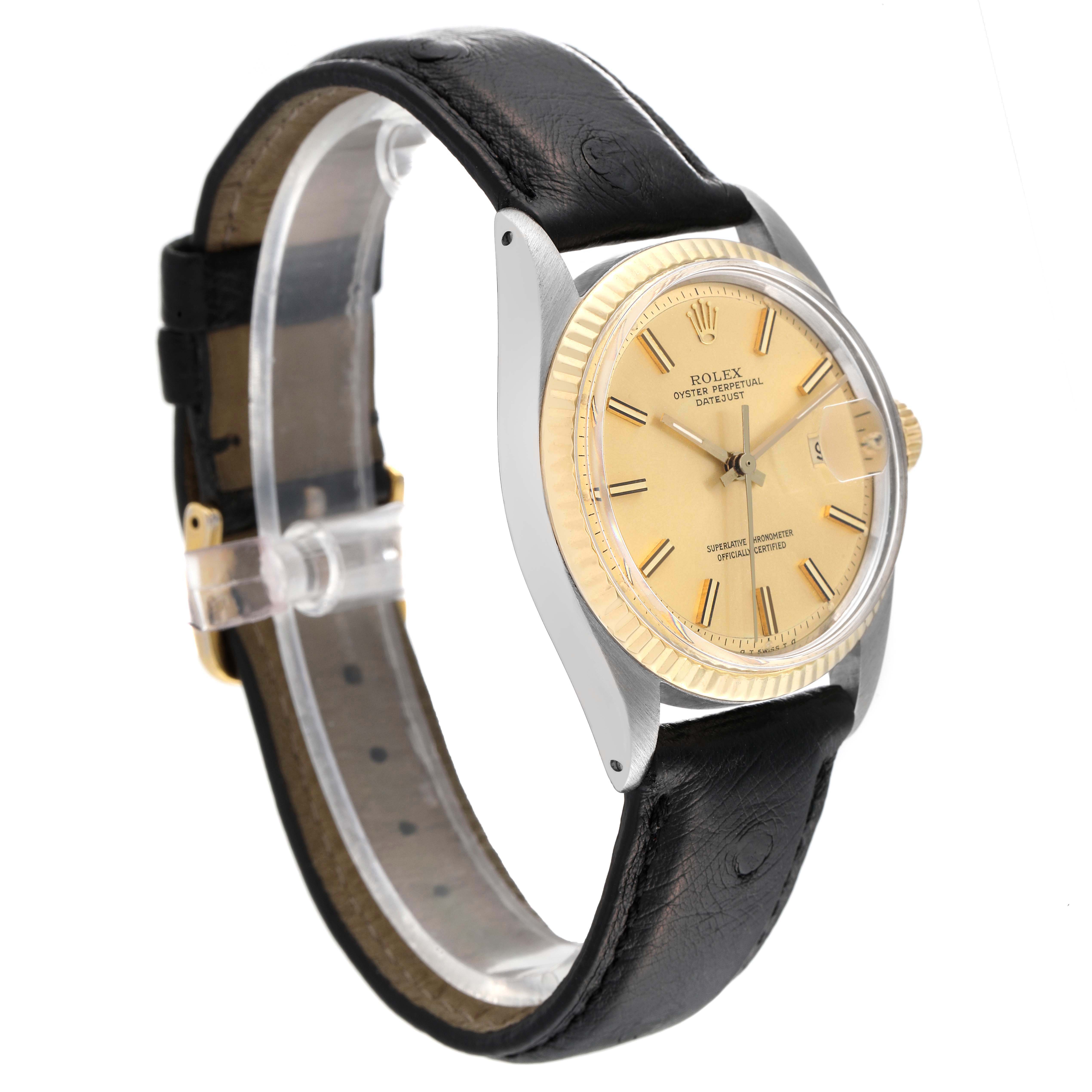 Side angle view of the Rolex Vintage Collection 1601 Men
s Steel and Gold (two tone) Champagne Dial 1601 Men
s Steel and Gold (two tone) Champagne Dial watch showing the face, black leather strap, and gold bezel.