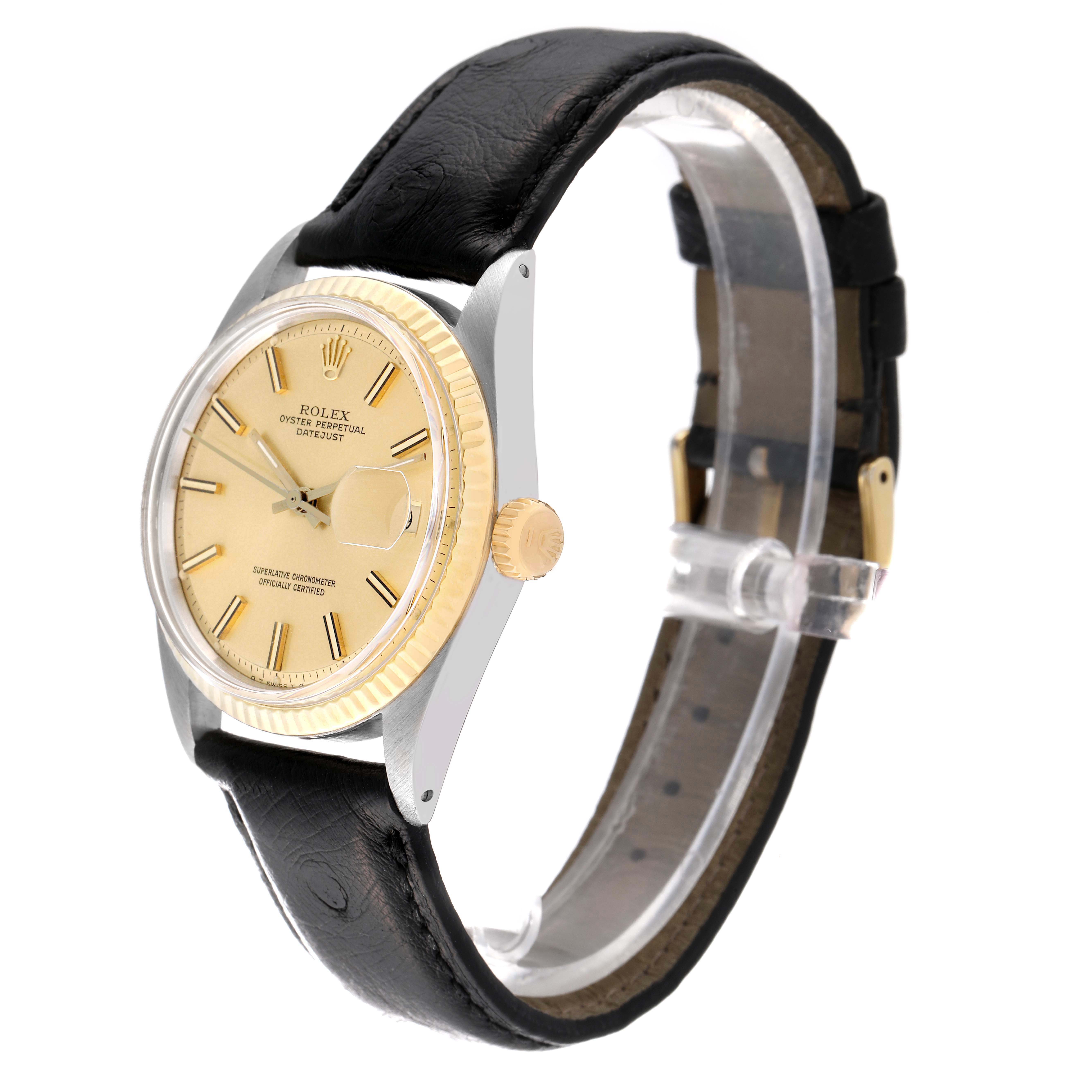 The Rolex Vintage Collection 1601 Men
s Steel and Gold (two tone) Champagne Dial 1601 Men
s Steel and Gold (two tone) Champagne Dial watch is shown at a three-quarter angle, highlighting the face, crown, and black leather strap.