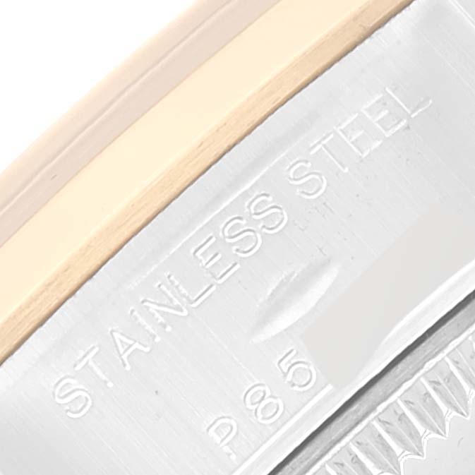 This image shows a close-up of the side of a Rolex Datejust 79163 Women's Steel and Gold (two tone) Black Dial 79163 Women's Steel and Gold (two tone) Black Dial watch, highlighting the "STAINLESS STEEL" engraving.