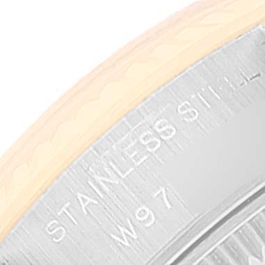 This image shows a close-up of the side of a stainless steel case back of the Rolex Datejust 69173 Women's Steel and Gold (two tone) Black Dial 69173 Women's Steel and Gold (two tone) Black Dial watch.