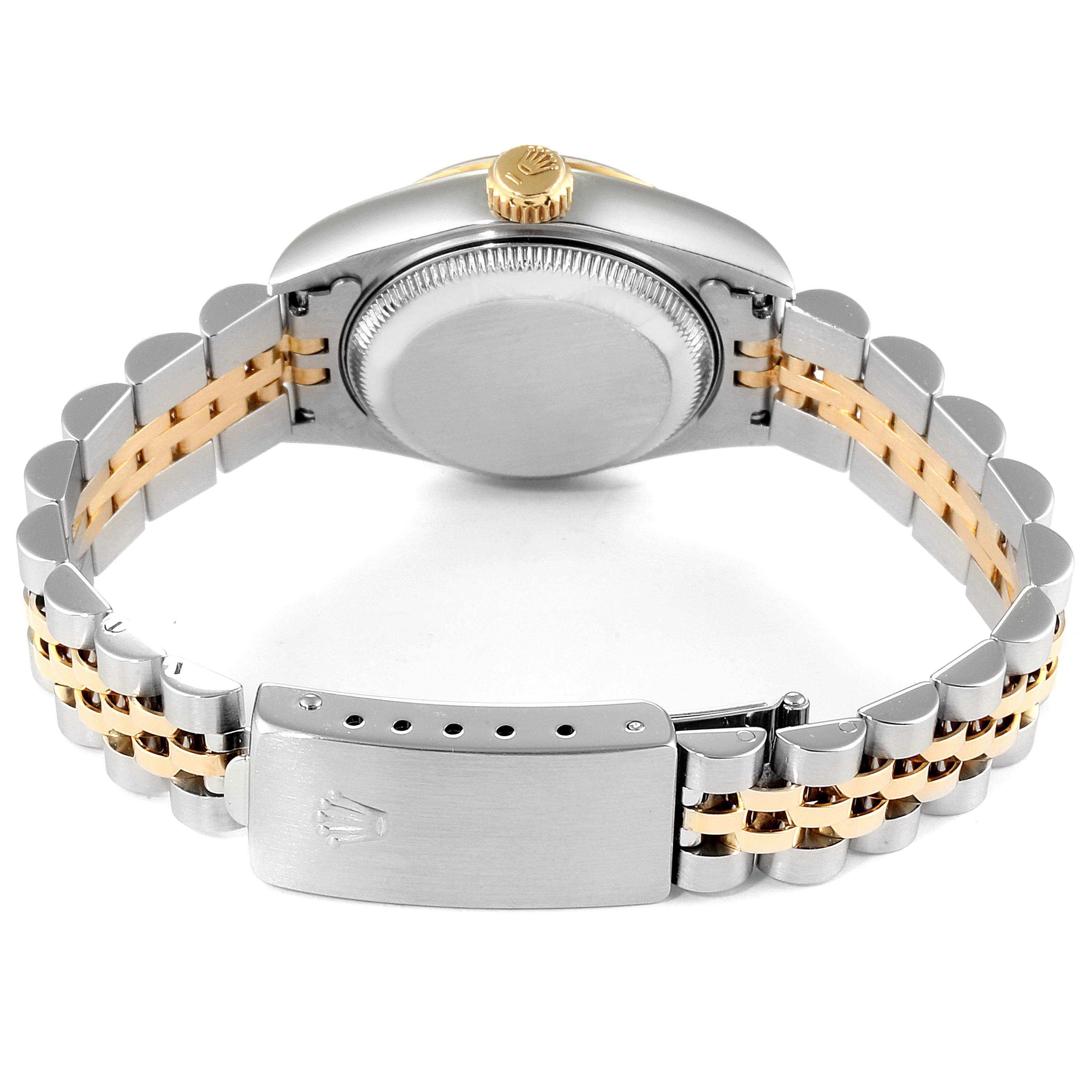 This image shows the back view of a Rolex Datejust 69173 Women
s Steel and Gold (two tone) Champagne Dial 69173 Women
s Steel and Gold (two tone) Champagne Dial watch, highlighting the case back, crown, and the two-tone bracelet with clasp.