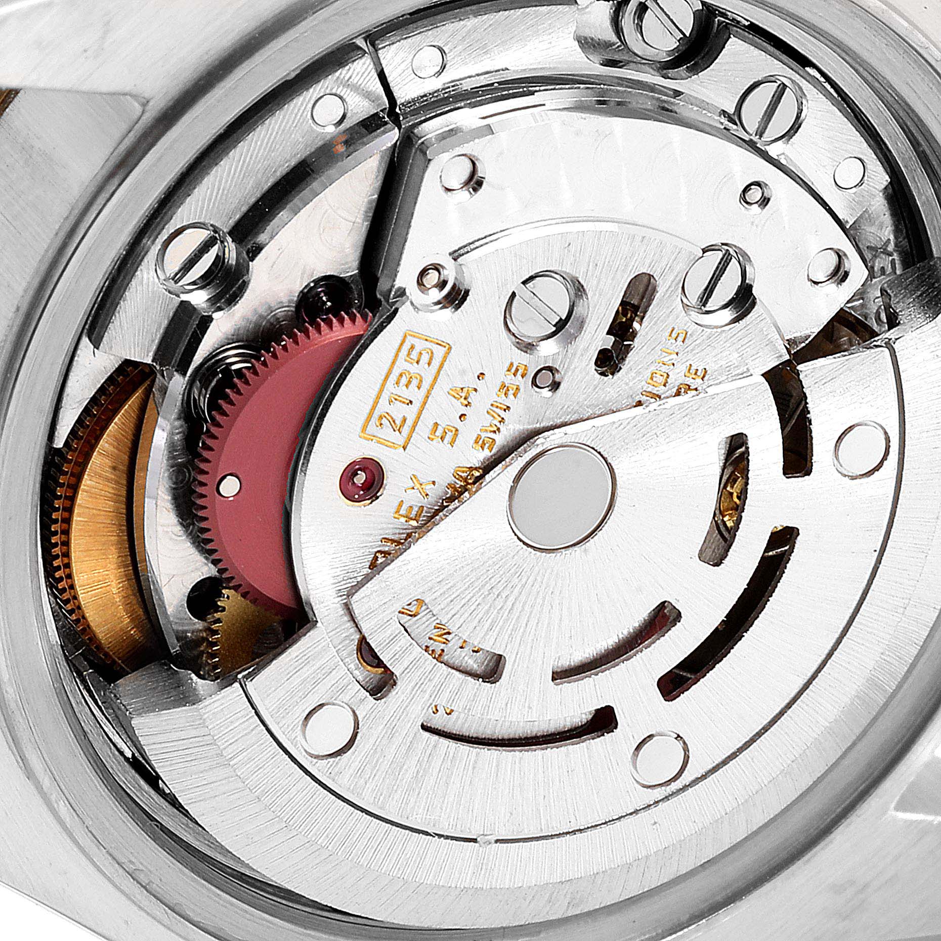 This is a close-up shot of the internal movement mechanism of a Rolex Datejust 69173 Women
s Steel and Gold (two tone) Champagne Dial 69173 Women
s Steel and Gold (two tone) Champagne Dial watch.