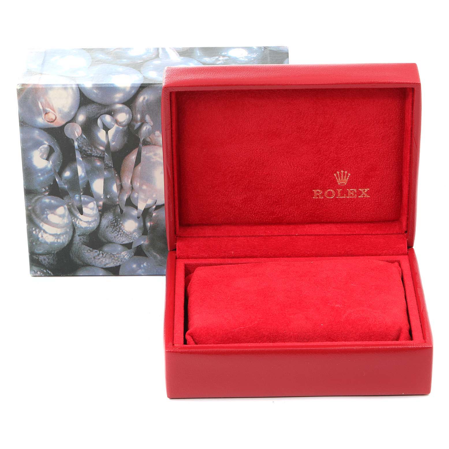 This image shows a red Rolex watch box for a Datejust model, including an outer decorative sleeve and an inner cushion.