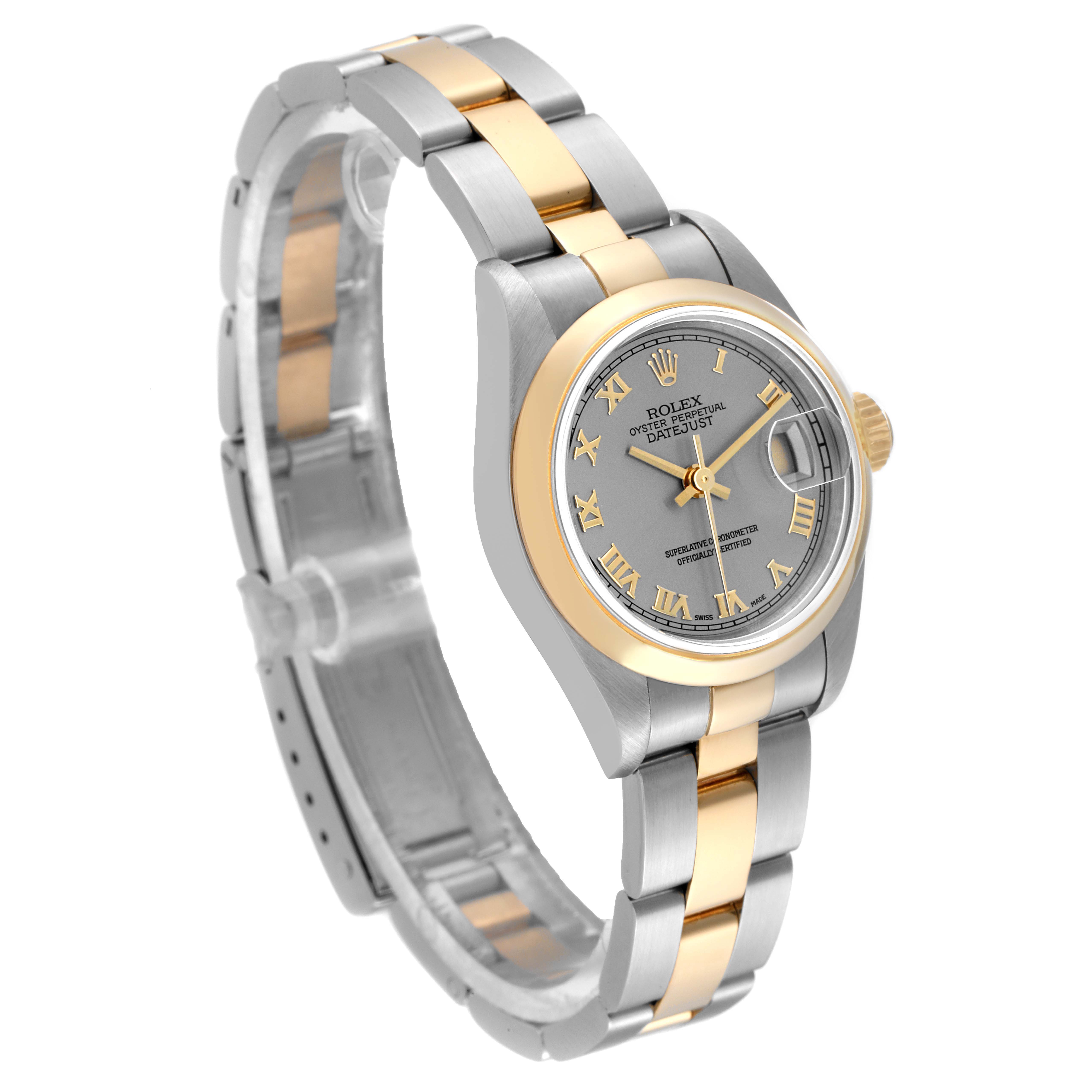 The Rolex Datejust 79163 Women
s Steel and Gold (two tone) Grey Dial 79163 Women
s Steel and Gold (two tone) Grey Dial watch is shown from a 3/4 angle, displaying the bracelet, face, and crown.