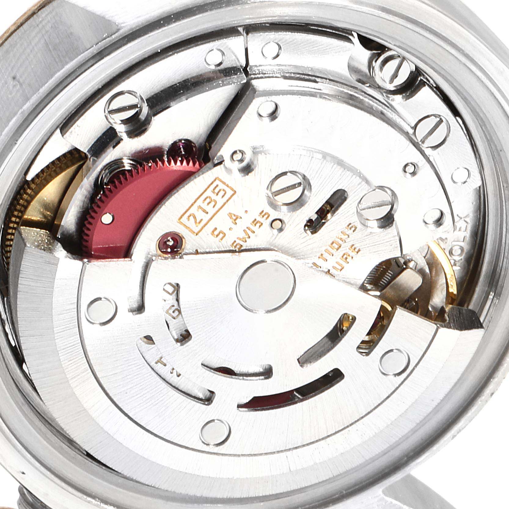 This image shows a close-up of the movement mechanism of a Rolex Datejust 69173 Women's Steel and Gold (two tone) White Dial 69173 Women's Steel and Gold (two tone) White Dial watch.