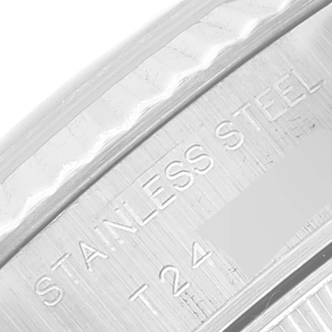 This close-up image shows the stainless steel bezel or caseback of a Rolex Datejust 69174 Women's Stainless Steel Silver Dial 69174 Women's Stainless Steel Silver Dial watch.