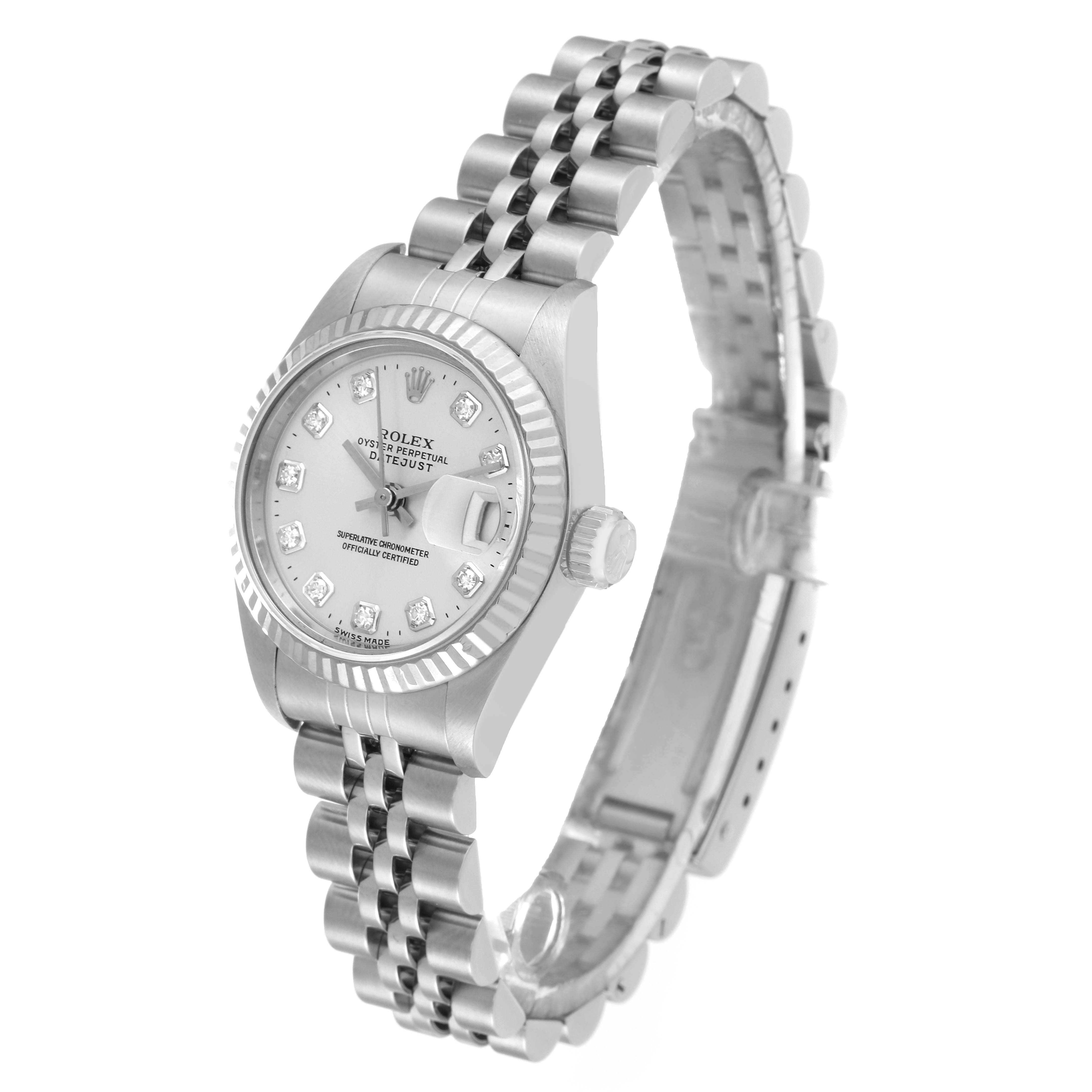 The Rolex Datejust 69174 Women's Stainless Steel Silver Dial 69174 Women's Stainless Steel Silver Dial watch is depicted at an angled view, showcasing its face, bracelet, and fluted bezel.