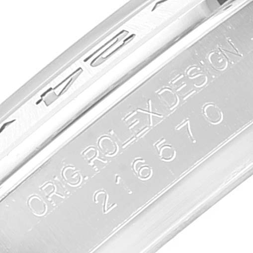 This image shows a close-up angle of the band or inner clasp of a Rolex Explorer 216570 Men's Stainless Steel Black Dial 216570 Men's Stainless Steel Black Dial model, with the engraving "ORG. ROLEX DESIGN 216570".