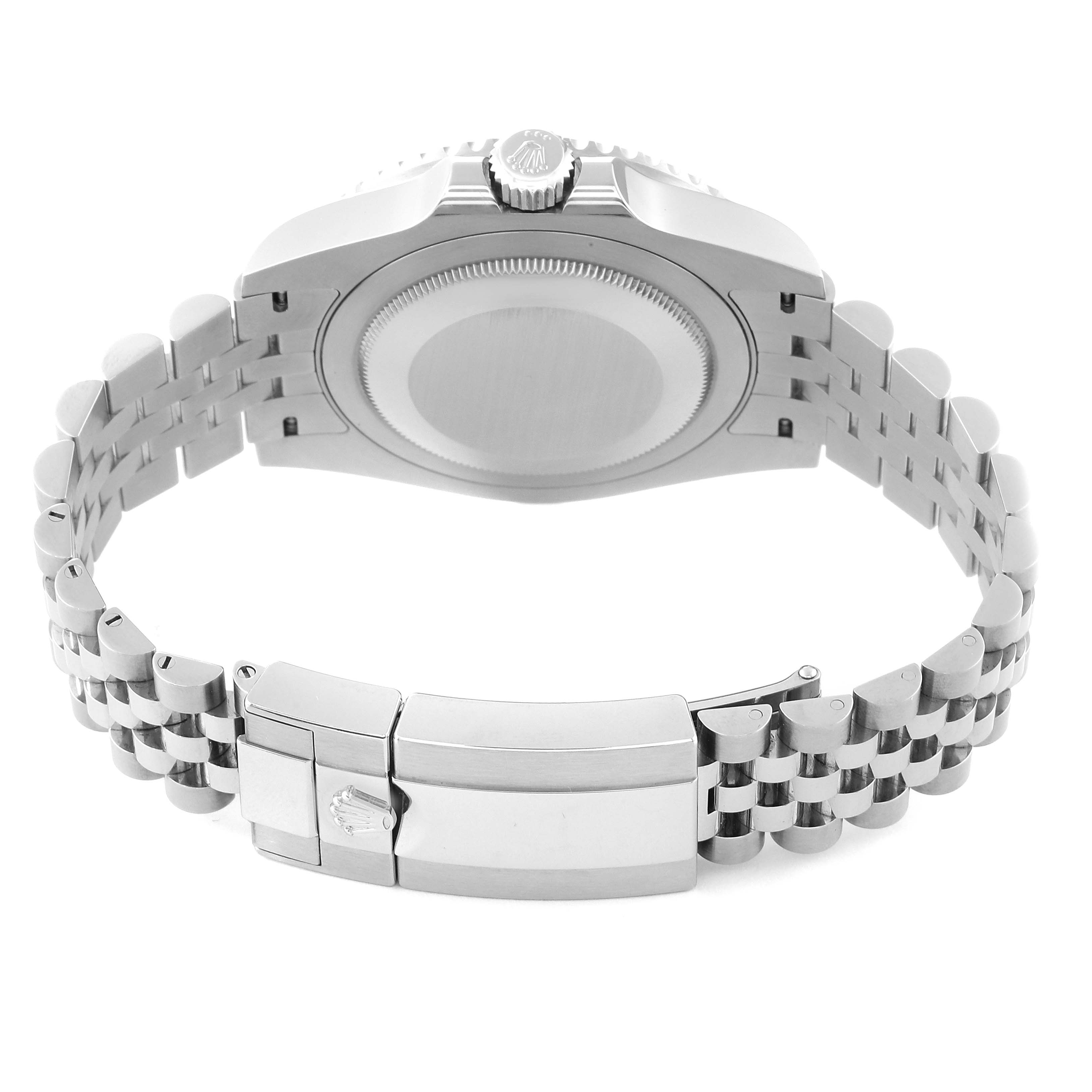 The image shows the back case, crown, and clasp of a Rolex GMT-Master 126710 Men
s Stainless Steel Black Dial 126710 Men
s Stainless Steel Black Dial watch from a rear angle.