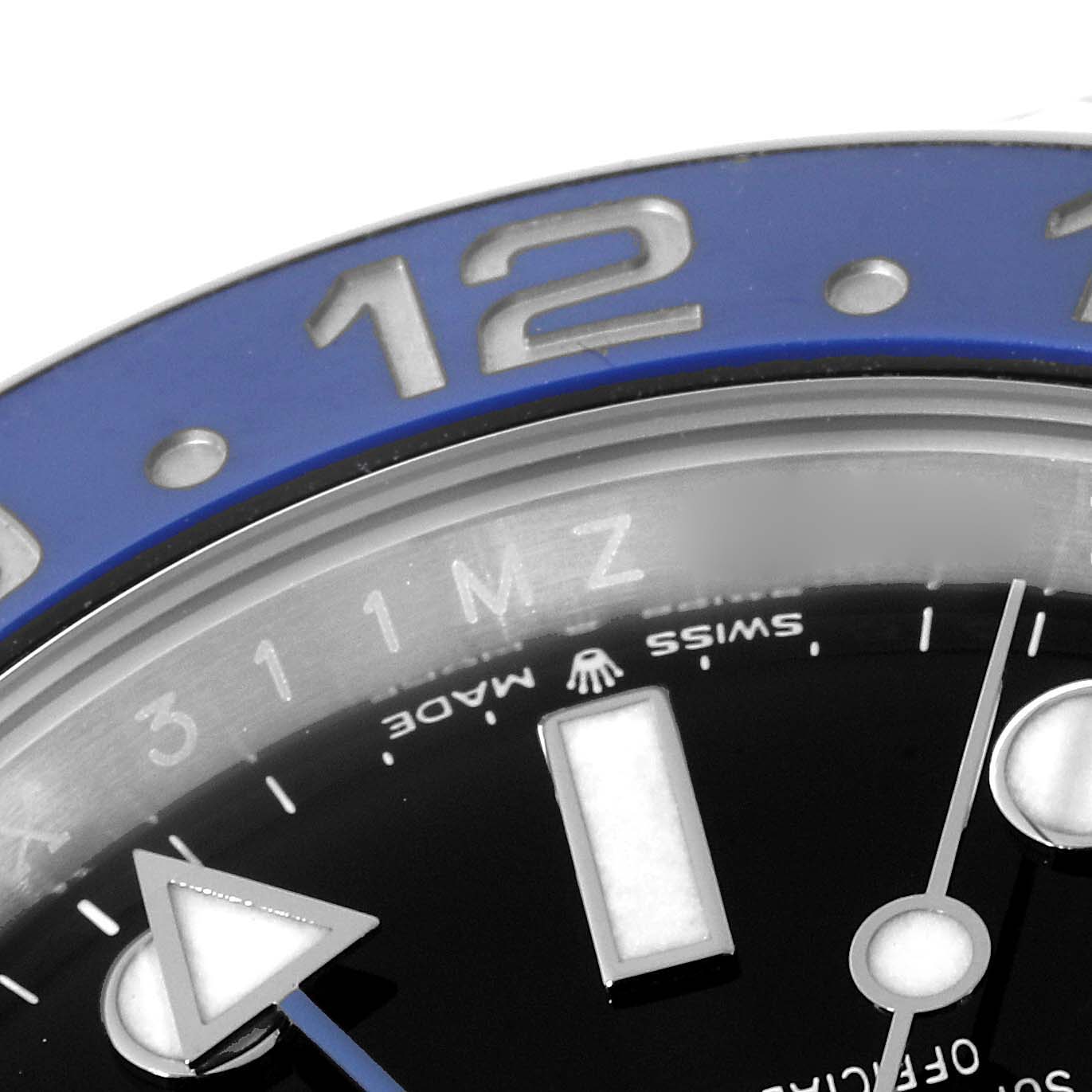 The image shows a close-up of the bezel and dial of a Rolex GMT-Master 126710 Men
s Stainless Steel Black Dial 126710 Men
s Stainless Steel Black Dial, featuring blue color and part of an hour marker.