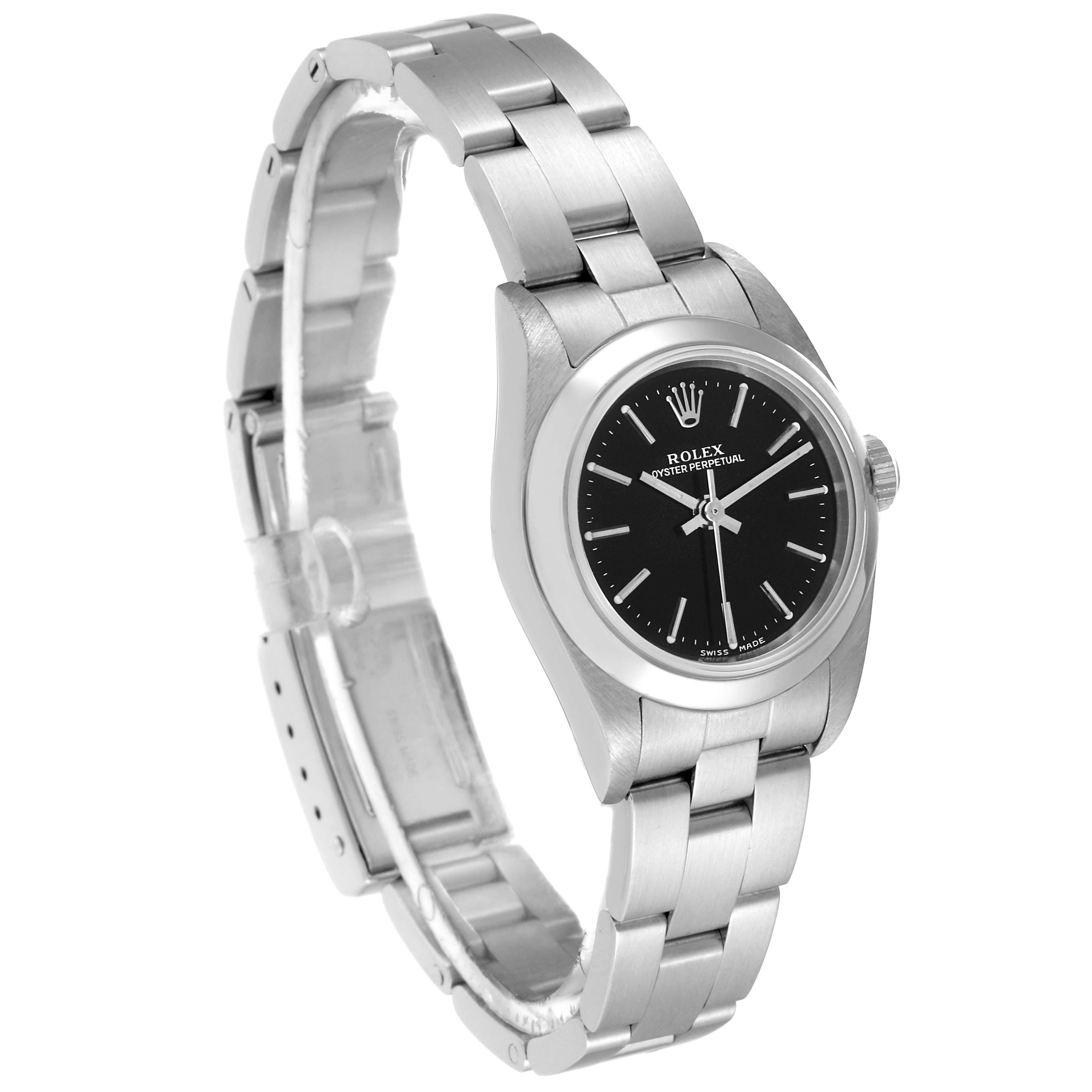 The image shows a Rolex Oyster Perpetual 76080 Women's Stainless Steel Black Dial 76080 Women's Stainless Steel Black Dial watch from a side angle, highlighting the bracelet, clasp, and dial.