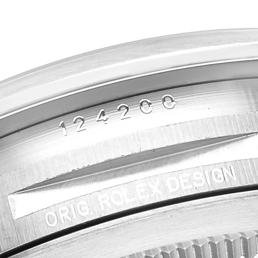 This image shows a close-up of the case back with engravings on the Rolex Oyster Perpetual 124200 Men's Stainless Steel Black Dial 124200 Men's Stainless Steel Black Dial watch model.