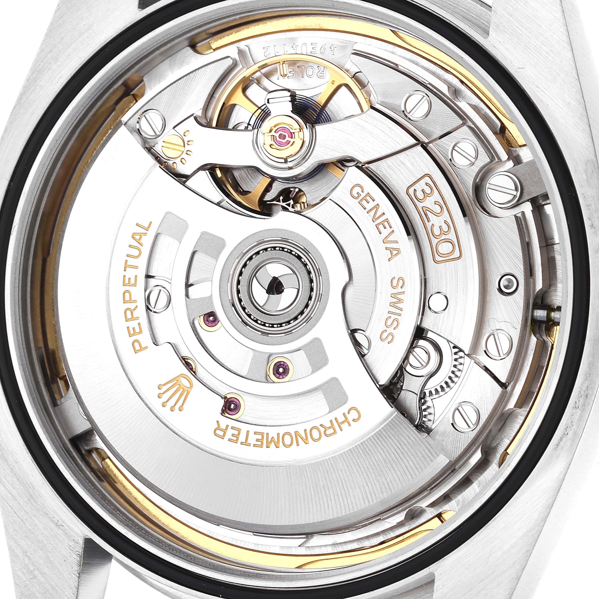 This is a close-up view of the movement mechanism of a Rolex Oyster Perpetual 124300 Men
s Stainless Steel Blue Dial 124300 Men
s Stainless Steel Blue Dial watch.