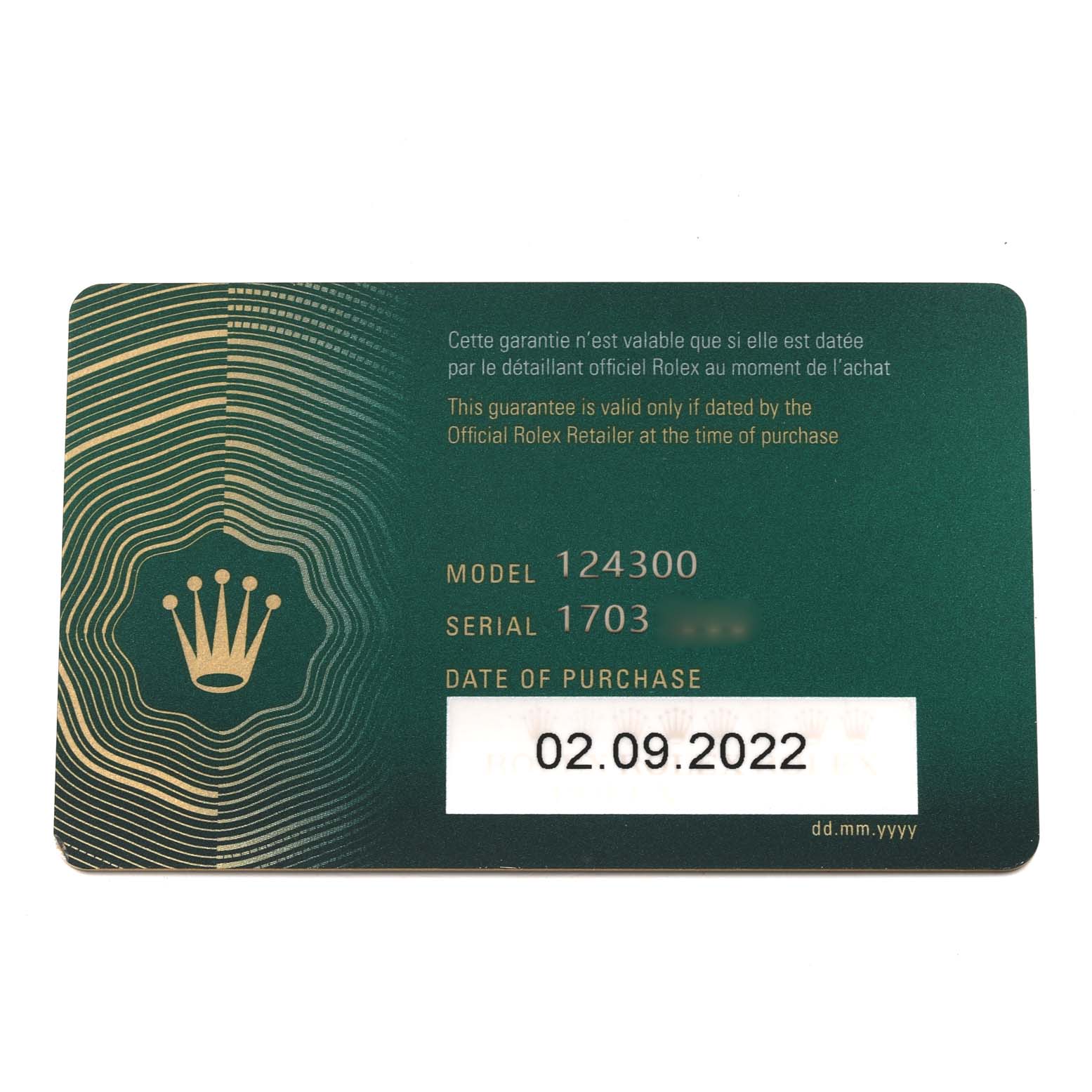 This image shows a green warranty card for a Rolex Oyster Perpetual 124300 Men
s Stainless Steel Blue Dial 124300 Men
s Stainless Steel Blue Dial model 124300, displaying the serial number and date of purchase.