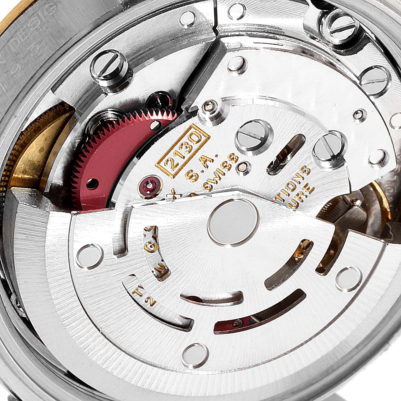 The image shows a close-up view of the movement and intricate internal mechanism of the Rolex Oyster Perpetual 67193 Women's Steel and Gold (two tone) Champagne Dial 67193 Women's Steel and Gold (two tone) Champagne Dial watch.