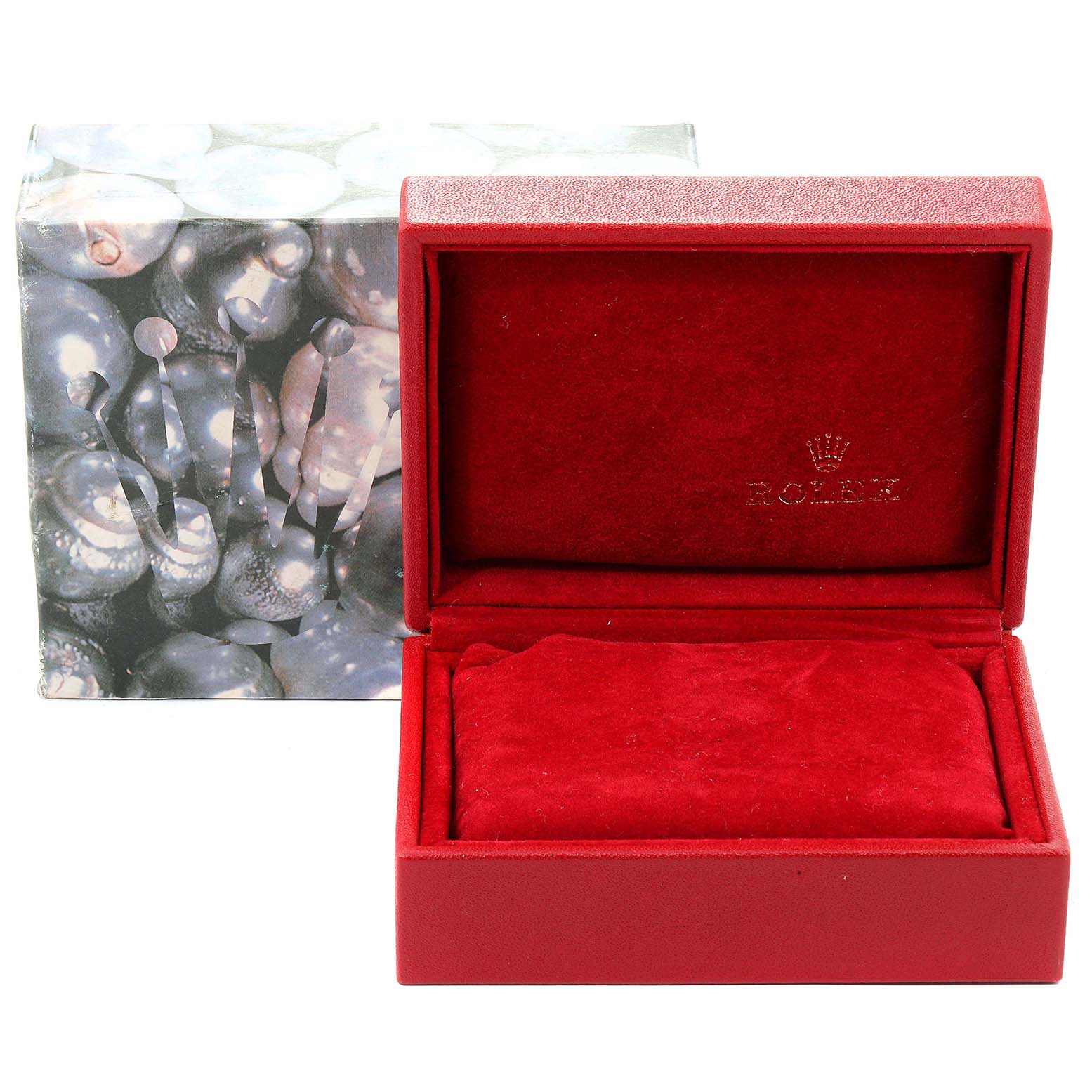 The image shows a red Rolex Oyster Perpetual 67193 Women's Steel and Gold (two tone) Champagne Dial 67193 Women's Steel and Gold (two tone) Champagne Dial watch box, with its cover open, alongside its decorative outer box.