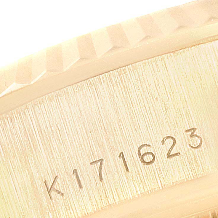 This image shows a close-up of the serial number engraved on the bezel of a Rolex President 79178  Women
s Yellow Gold Champagne Dial 79178  Women
s Yellow Gold Champagne Dial model watch.