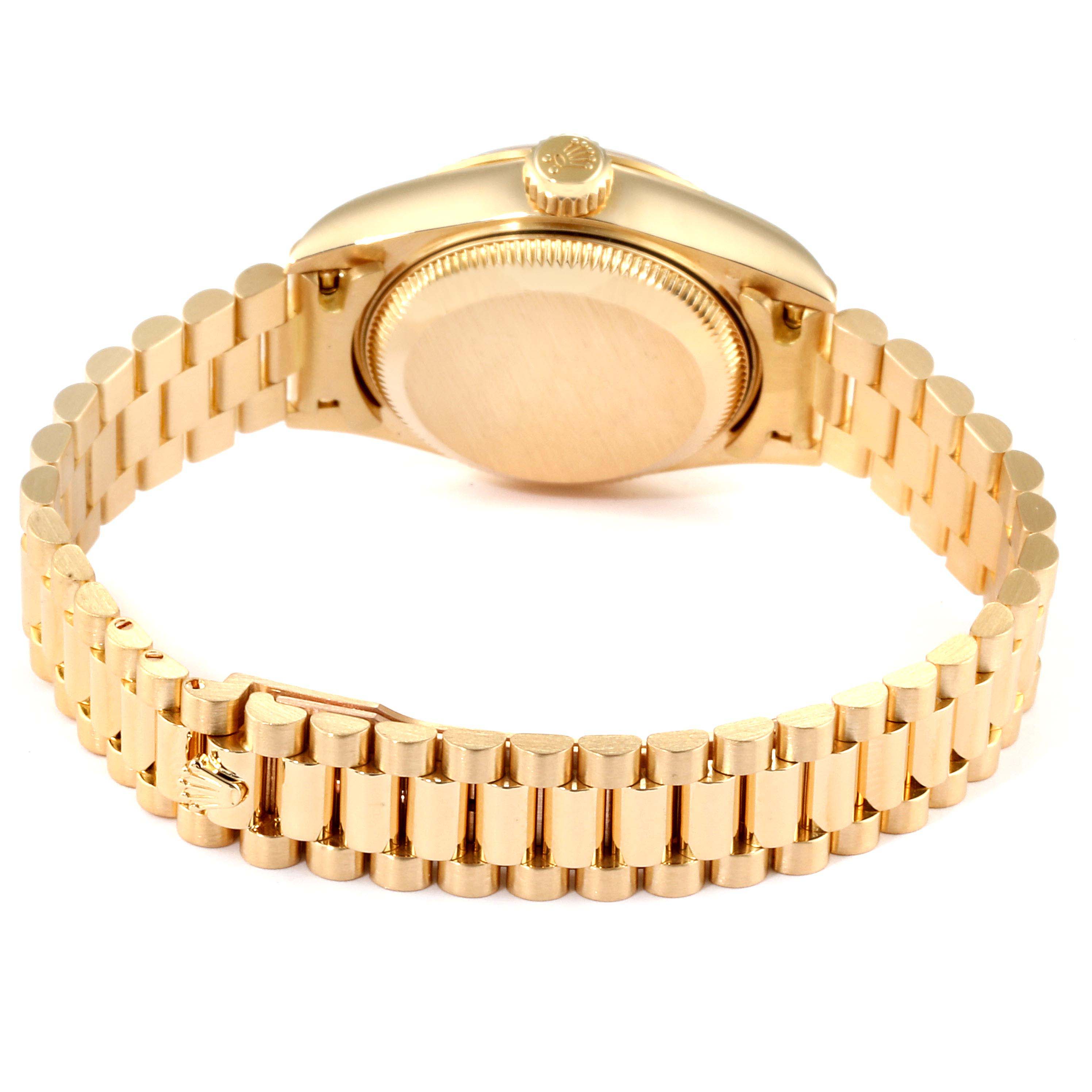 This image shows the back case and bracelet of a Rolex President 79178  Women
s Yellow Gold Champagne Dial 79178  Women
s Yellow Gold Champagne Dial model watch, viewed from the rear.