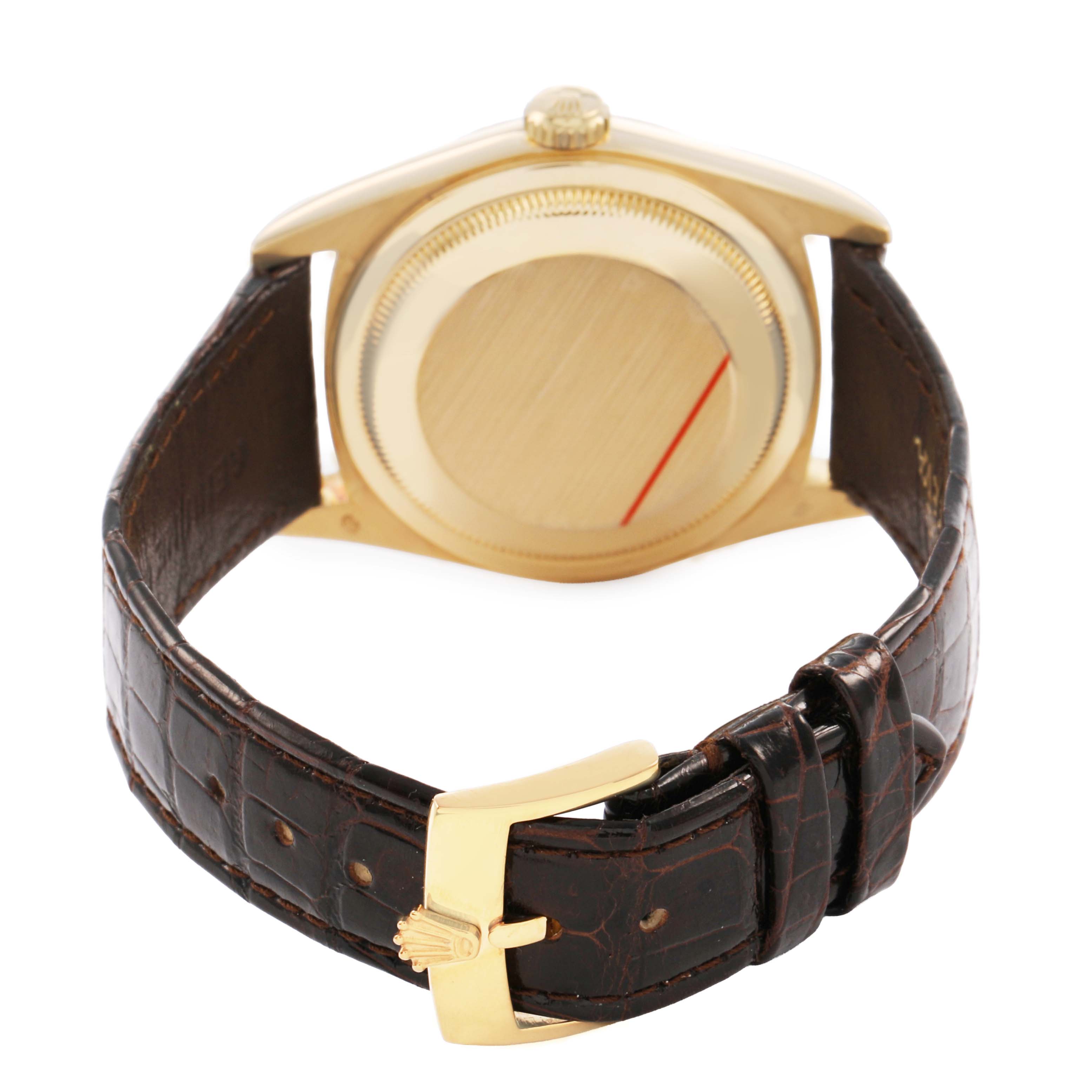The image shows the back view of a Rolex President 18238 Mens Yellow Gold Champagne Dial watch, focusing on the case back and leather strap with buckle.