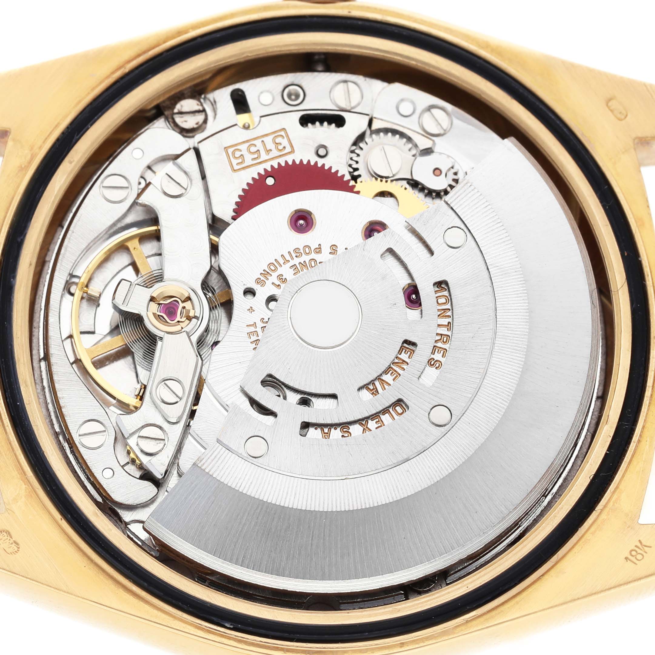 The image shows the back view of a Rolex President 18238 Mens Yellow Gold Champagne Dial watch, revealing its intricate movement and rotor mechanism.