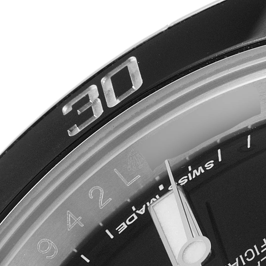 This close-up image shows the bezel and partial dial of a Rolex Submariner 116610 Men's Stainless Steel Black Dial 116610 Men's Stainless Steel Black Dial watch.