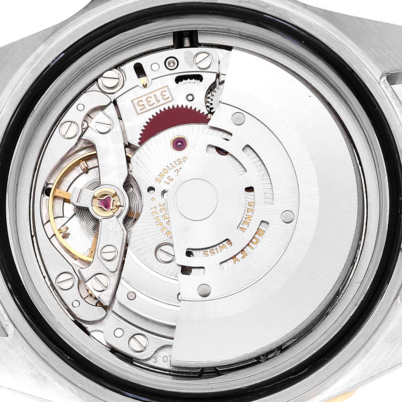 The image shows the internal mechanics and rotor of a Rolex Submariner 16613 Men
s Steel and Gold (two tone) Blue Dial 16613 Men
s Steel and Gold (two tone) Blue Dial viewed from the back of the watch case.