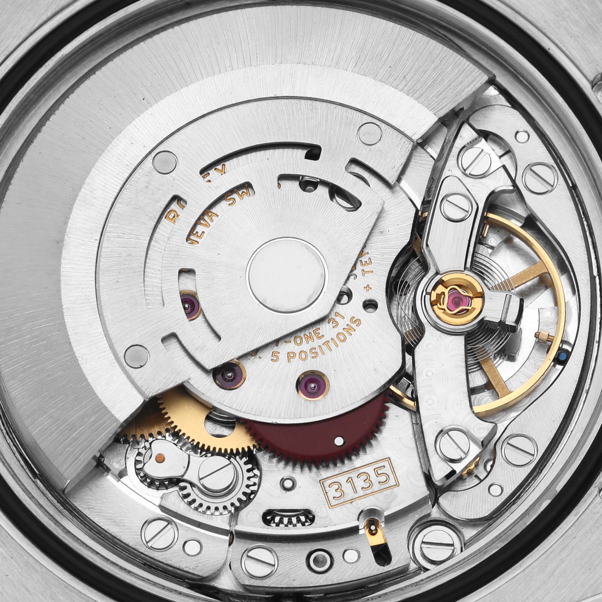 This image shows a close-up of the intricate internal movement of a Rolex Turn-o-Graph 116264 Men
s Stainless Steel White Dial 116264 Men
s Stainless Steel White Dial watch.