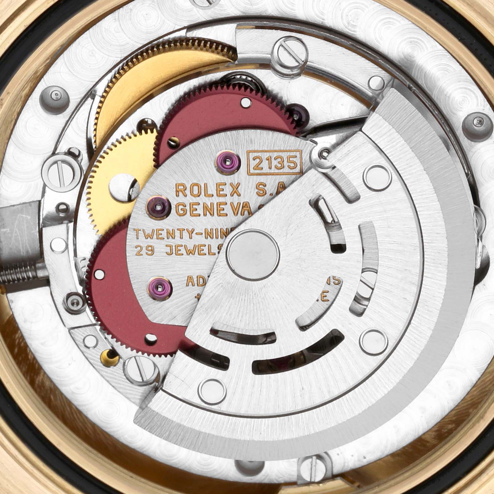 This image shows a close-up of the movement mechanism of a Rolex Yacht-Master 68628 Men's Yellow Gold White Dial 68628 Men's Yellow Gold White Dial watch.
