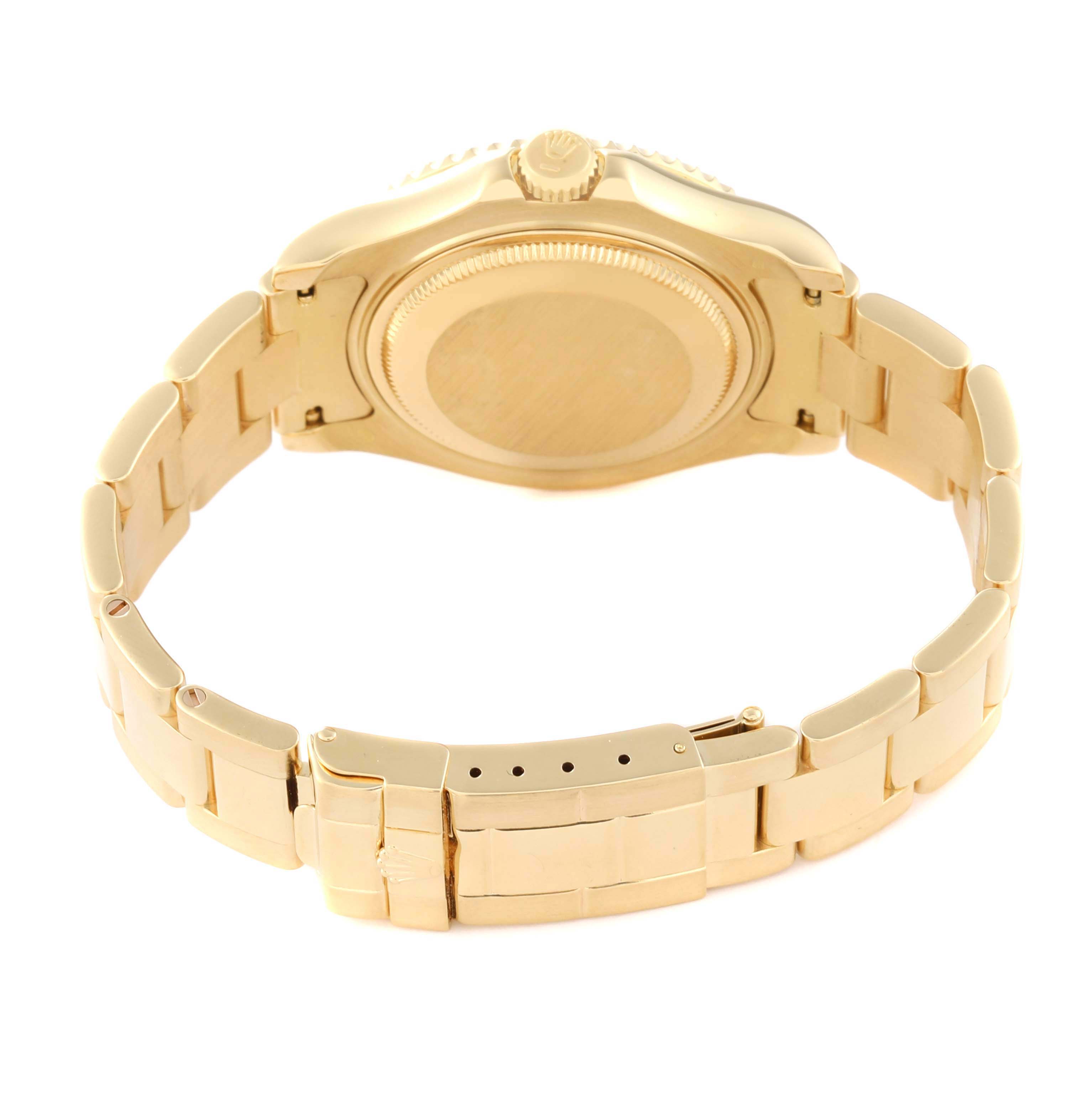 The image shows the underside and bracelet of a Rolex Yacht-Master 68628 Men's Yellow Gold White Dial 68628 Men's Yellow Gold White Dial watch from a rear angle.