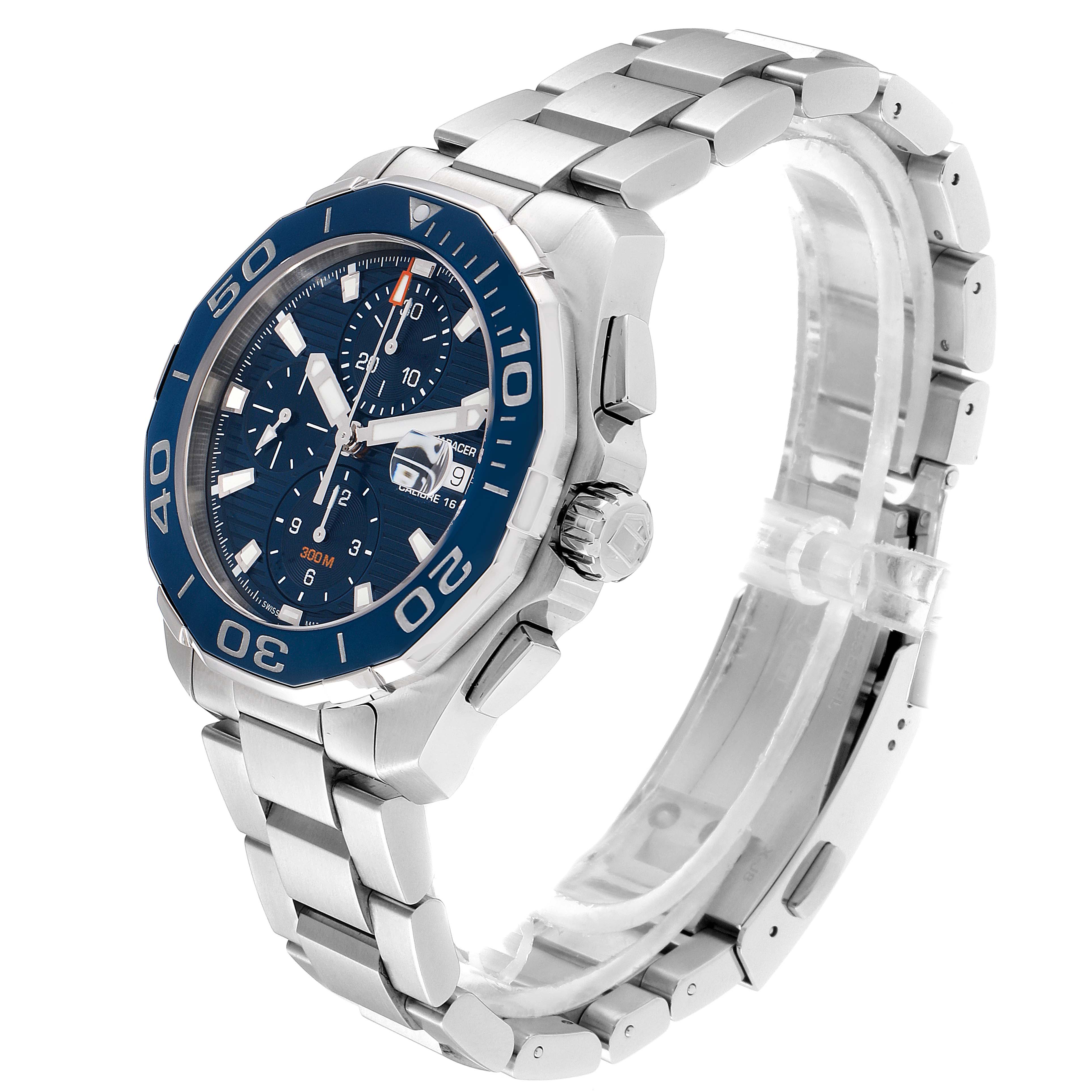 The image shows a side angle of the Tag Heuer Aquaracer CAY211B.BA0927  Men's Stainless Steel Blue Dial CAY211B.BA0927  Men's Stainless Steel Blue Dial watch highlighting its blue bezel, stainless steel strap, and crown.