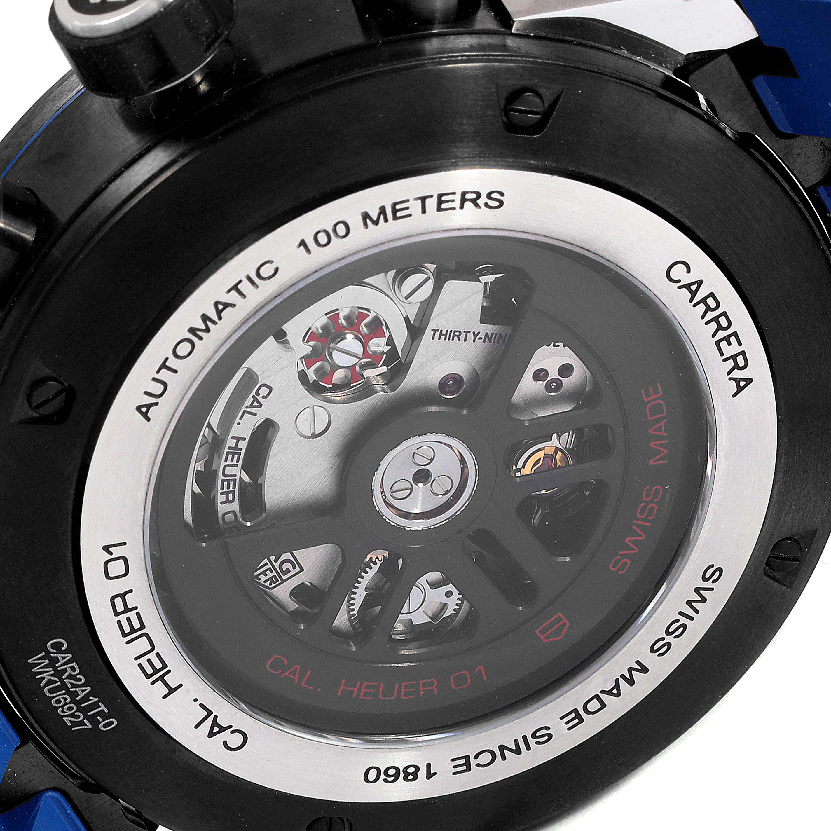 The image shows the back of a Tag Heuer Carrera CAR2A1T.FT6052 Men's Titanium Black Dial CAR2A1T.FT6052 Men's Titanium Black Dial watch, focusing on the automatic movement and intricate internal components.